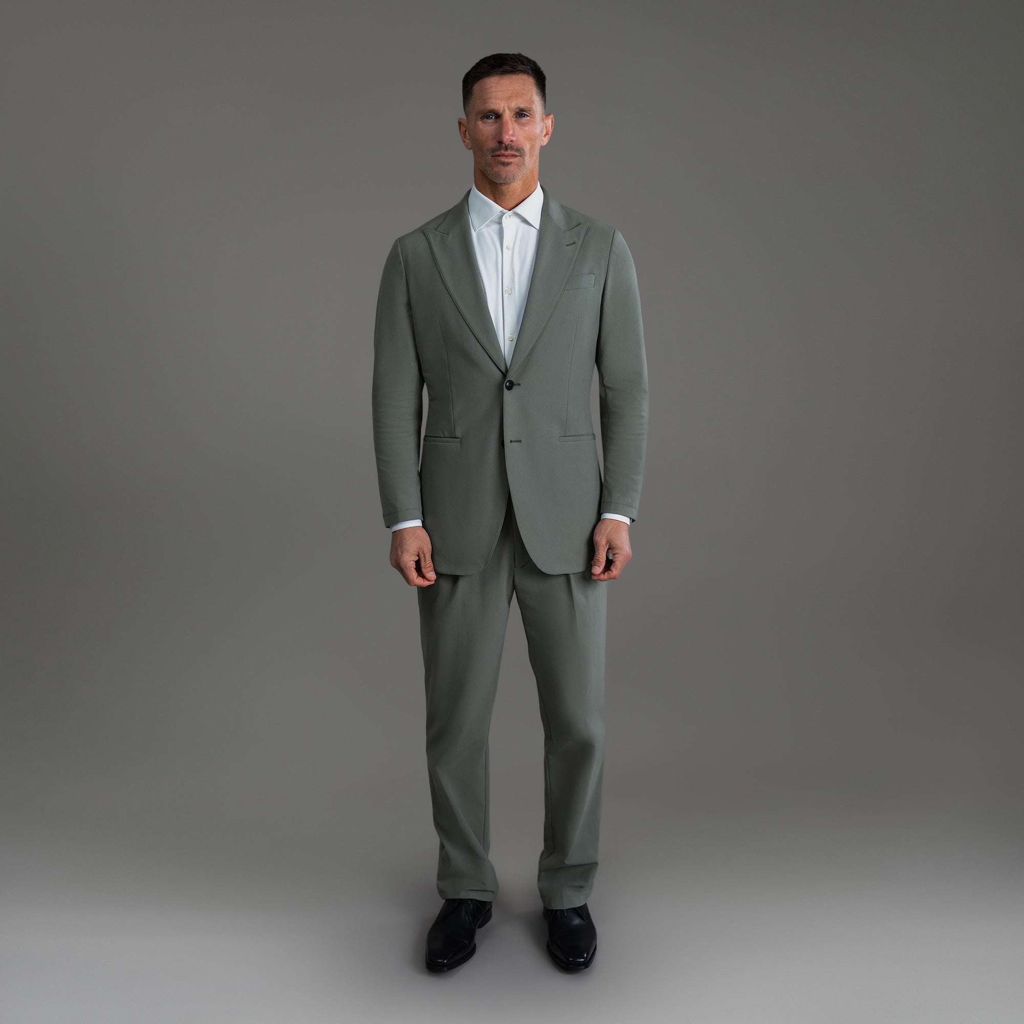 Custom Peak Lapel Tuxedo model Tyler in Sage Gray