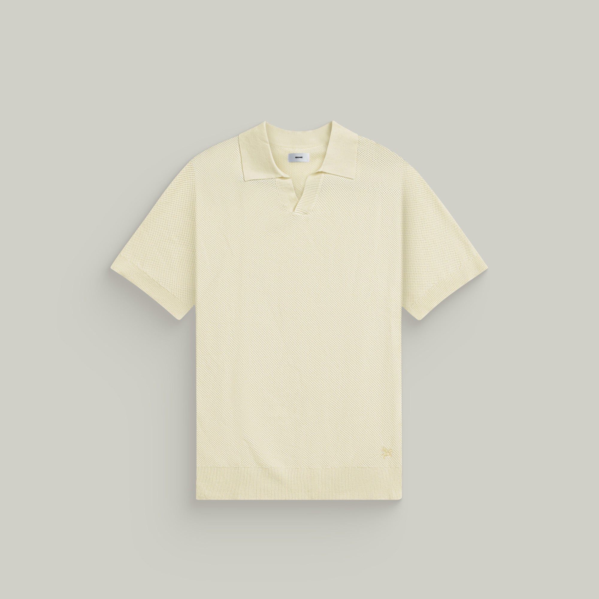 Buttonless Knit Polo model Tyler in Vanilla