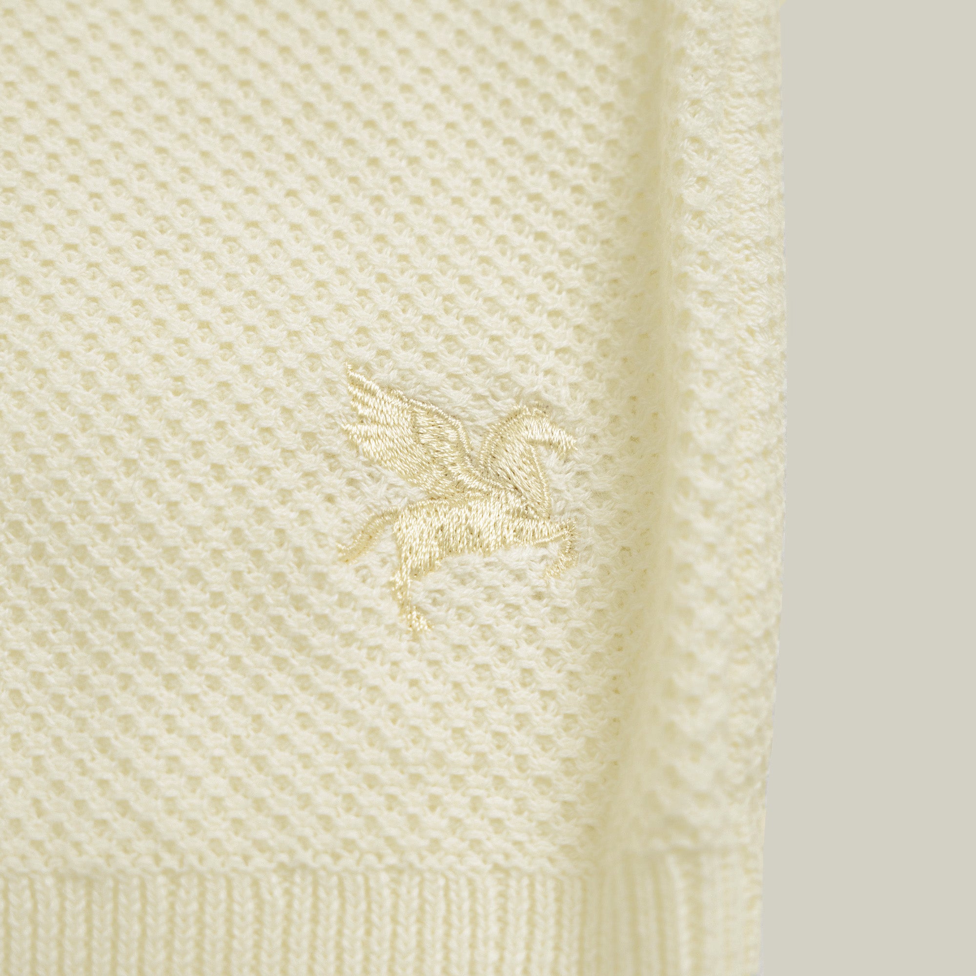 Buttonless Knit Polo model Tyler in Vanilla