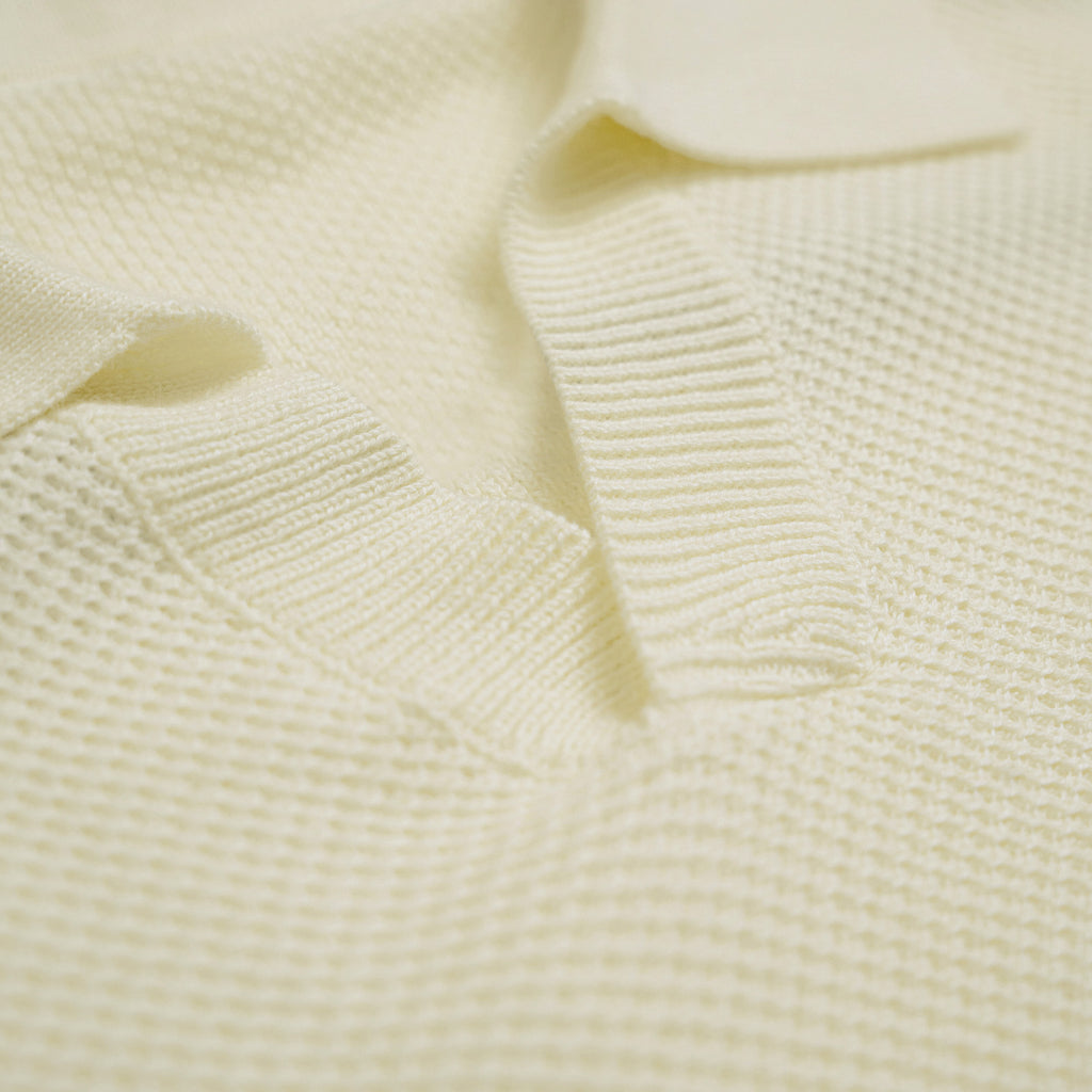 Buttonless Knit Polo model Tyler in Vanilla