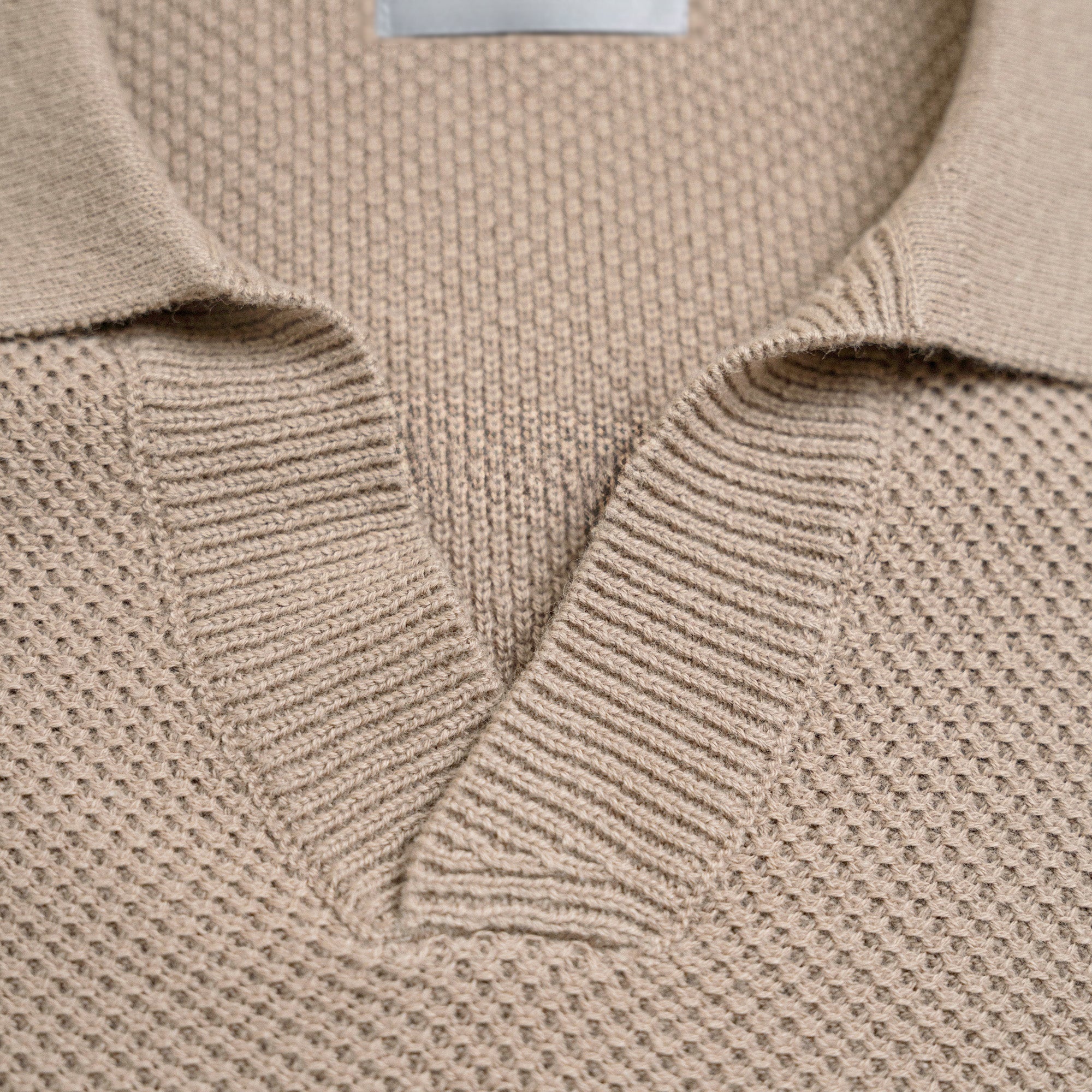 Buttonless Knit Polo model Tyler in Toffee
