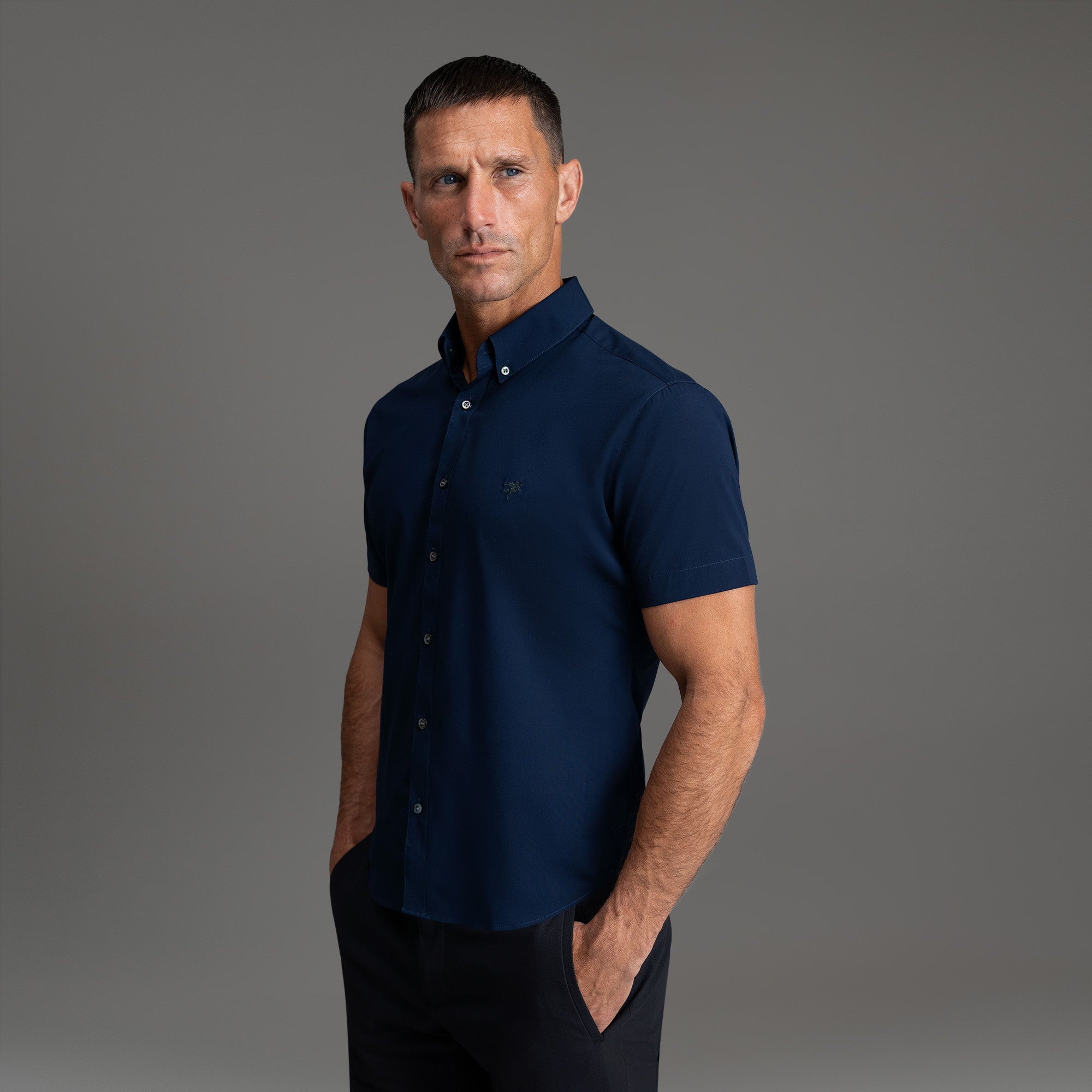 Custom Bespoke Tailored Spread Shirt model Tyler in Navy Emblem
