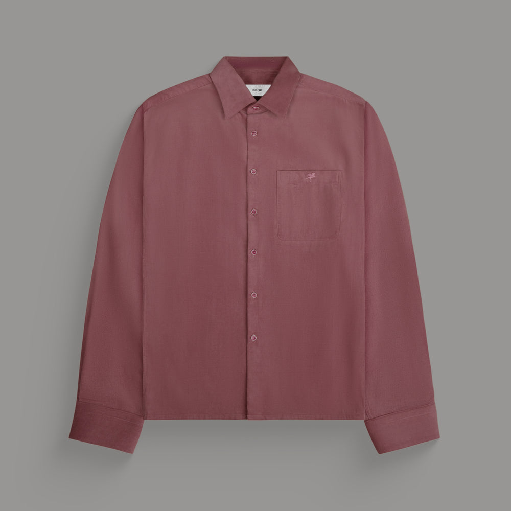 Dusty rose long-sleeve button-up shirt with pocket and stitched logo on chest.