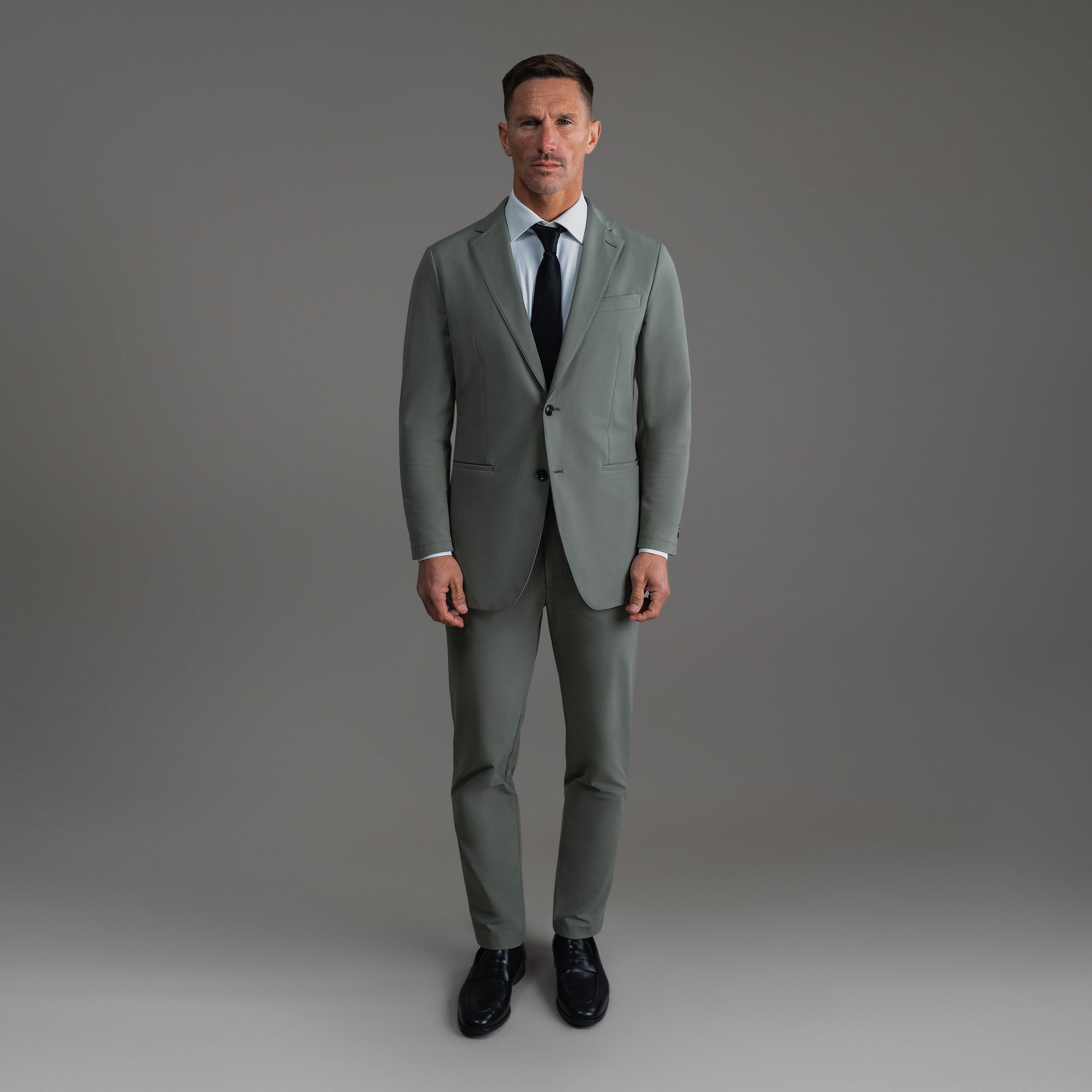 Tags:(6'0"|180 lbs) Bespoke custom athleisure technical men's suit los angeles model Tyler in Sage Gray