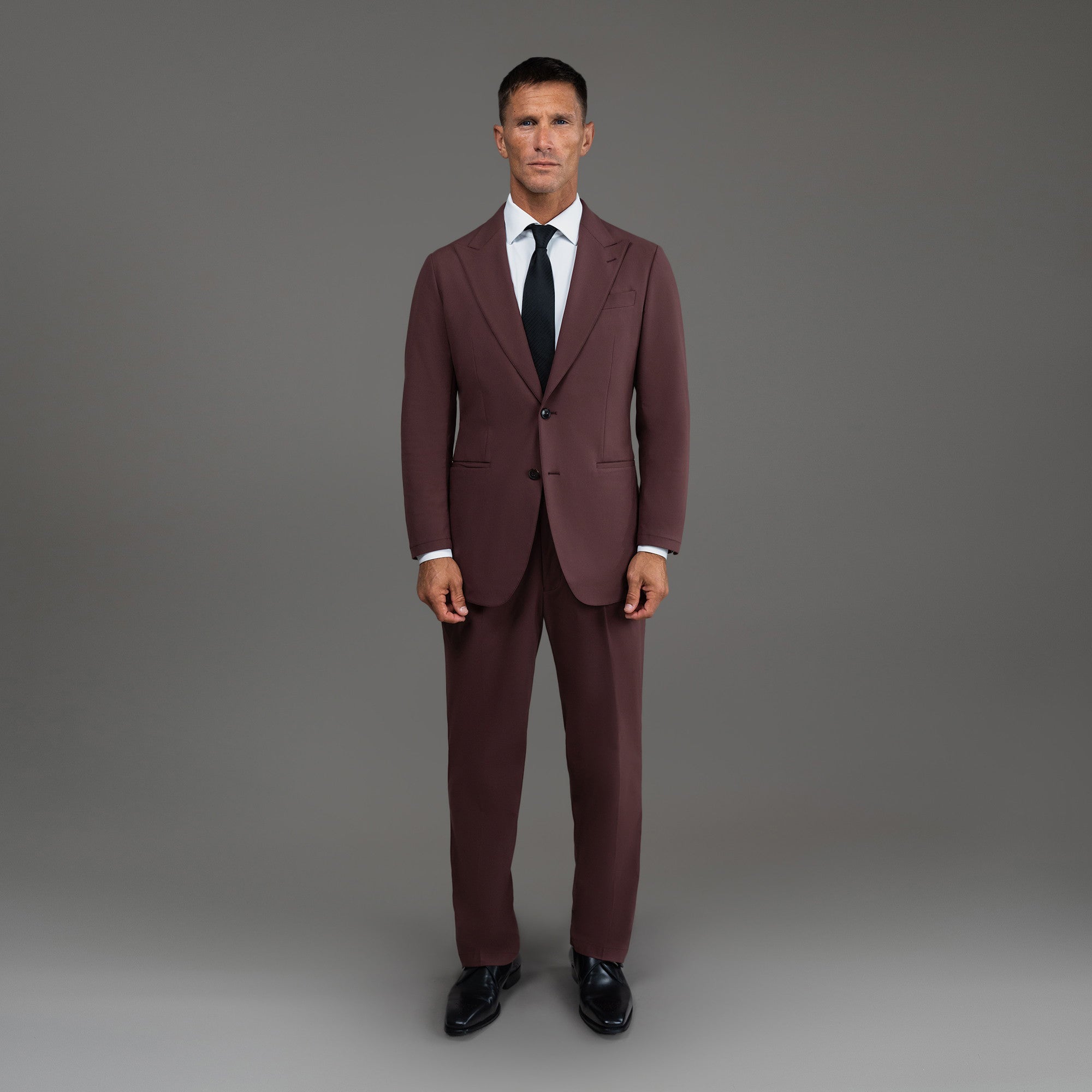 Custom Peak Lapel Tuxedo model Tyler in Maroon