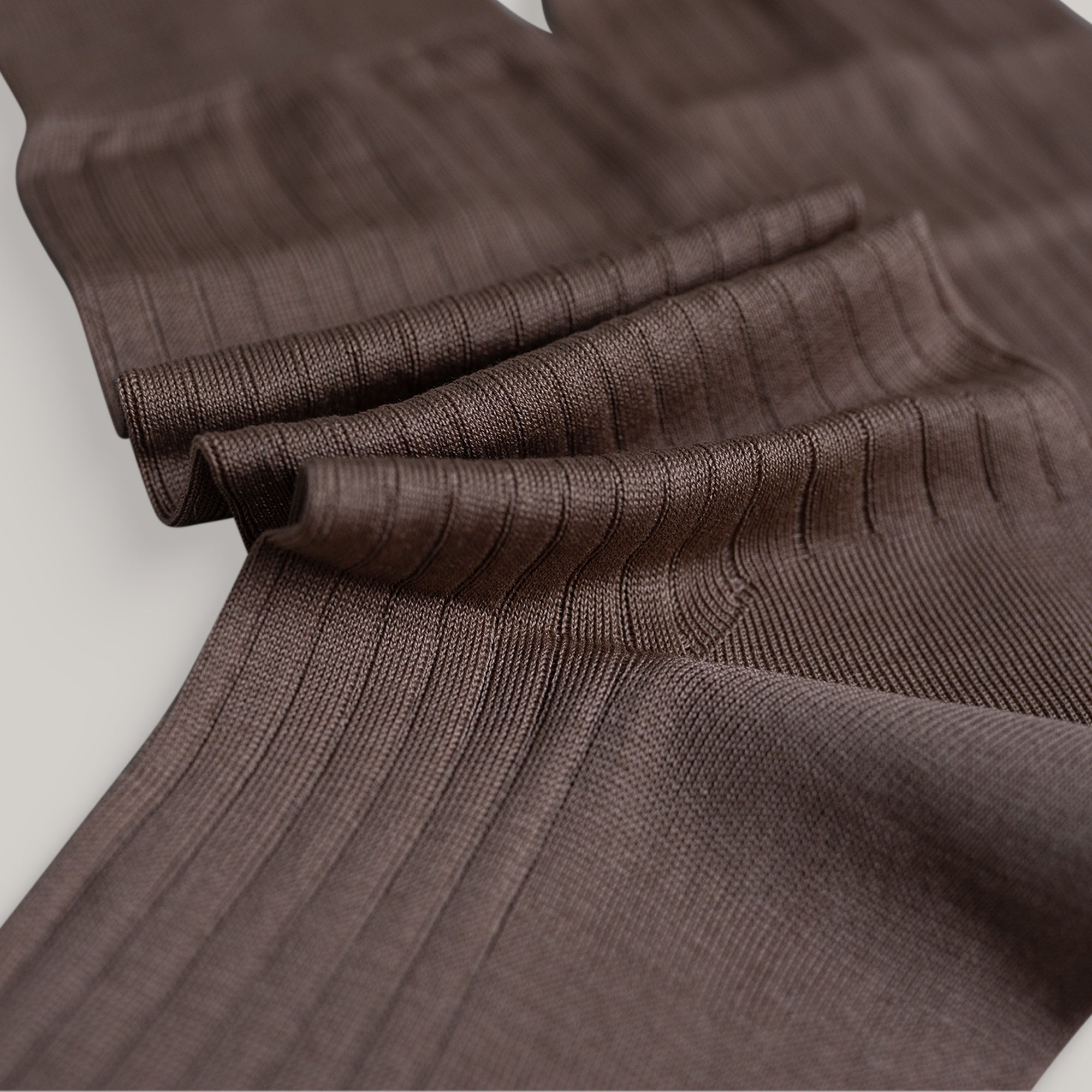 Sene Socks model flatlay in Tan