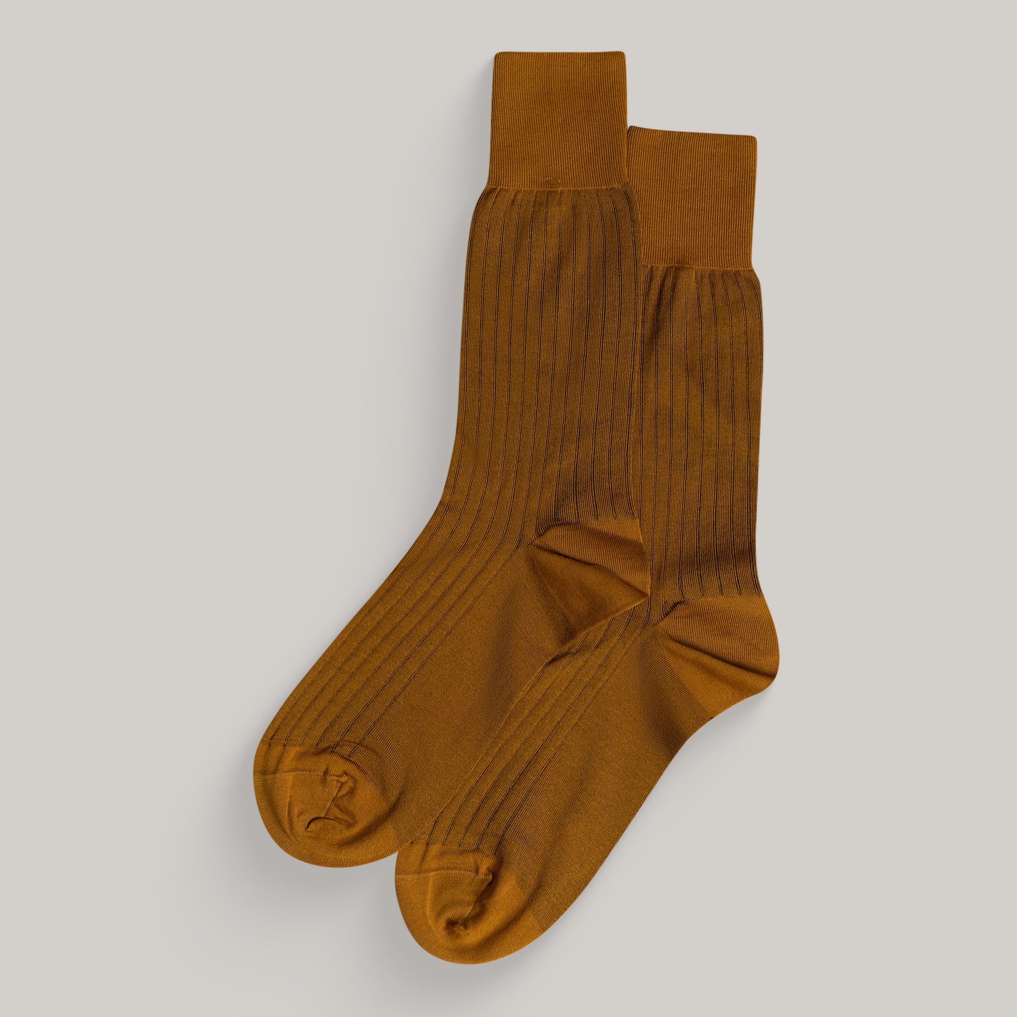 Sene Socks model flatlay in Burnt Orange