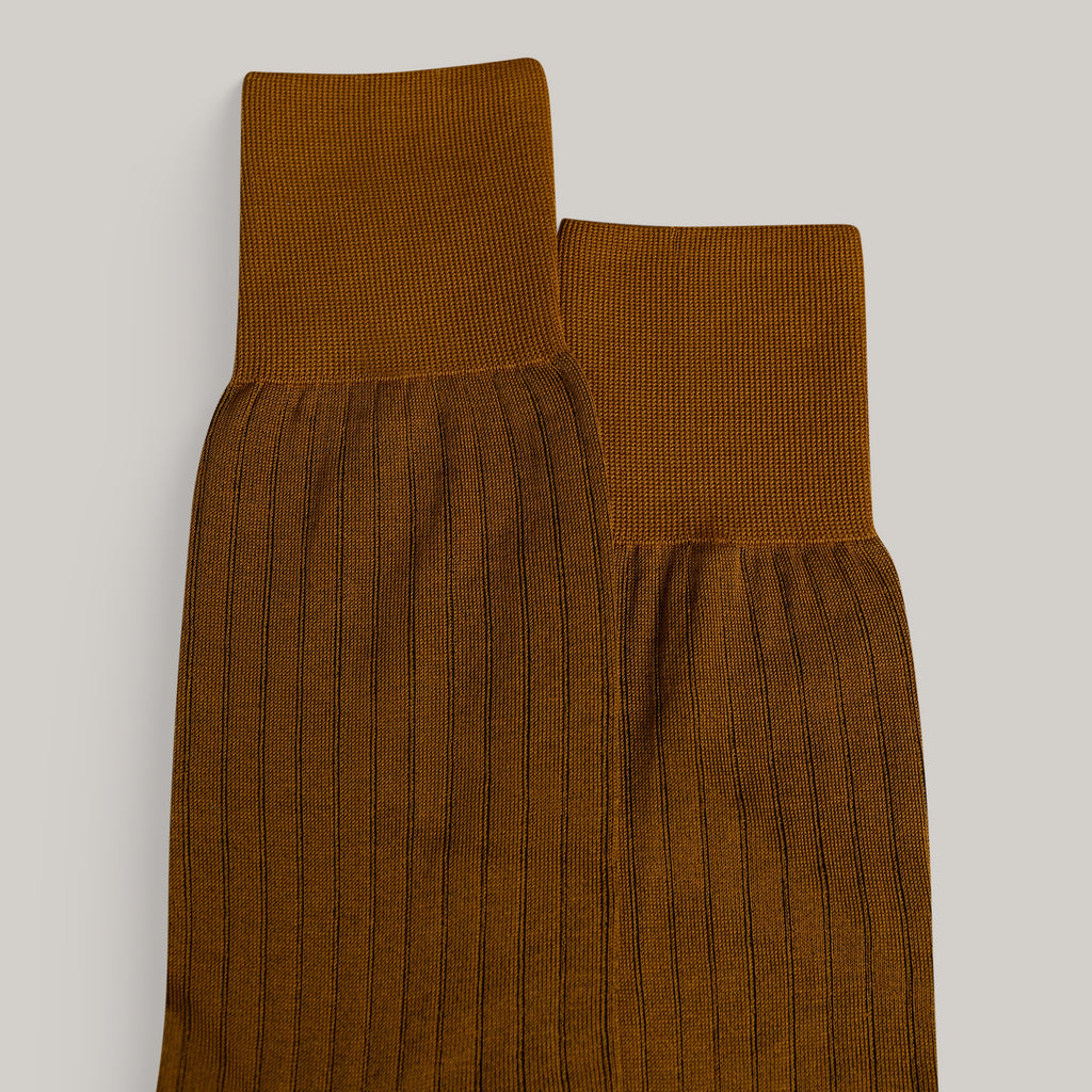 Sene Socks model flatlay in Burnt Orange