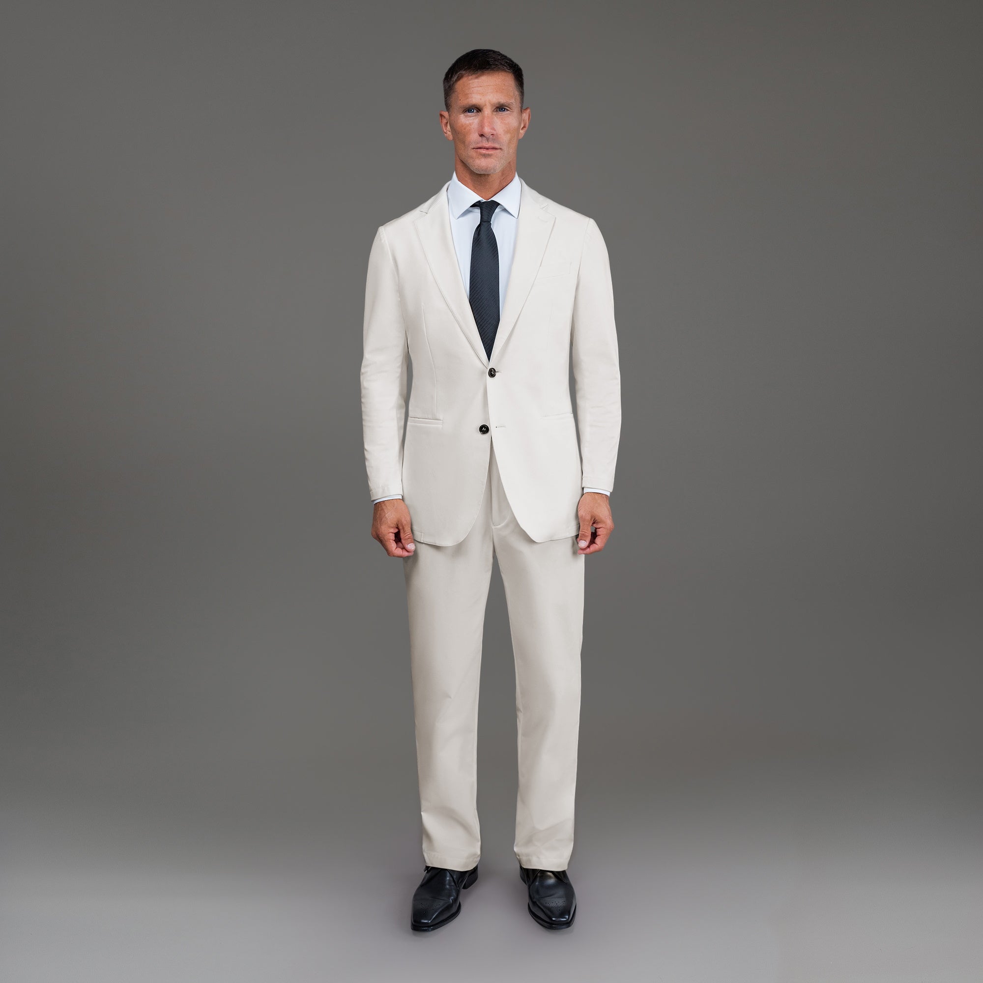 Bespoke custom athleisure technical men's suit los angeles model Tyler in Cream