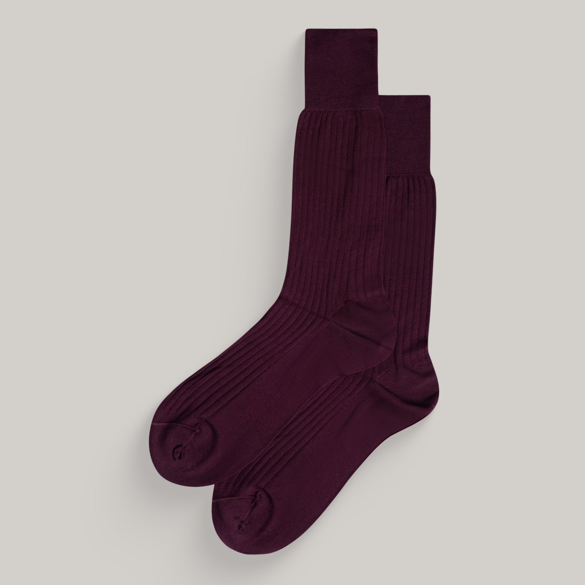 Sene Socks model flatlay in Burgundy