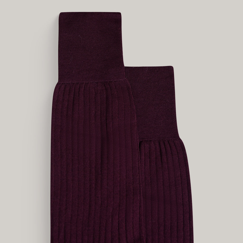 Sene Socks model flatlay in Burgundy