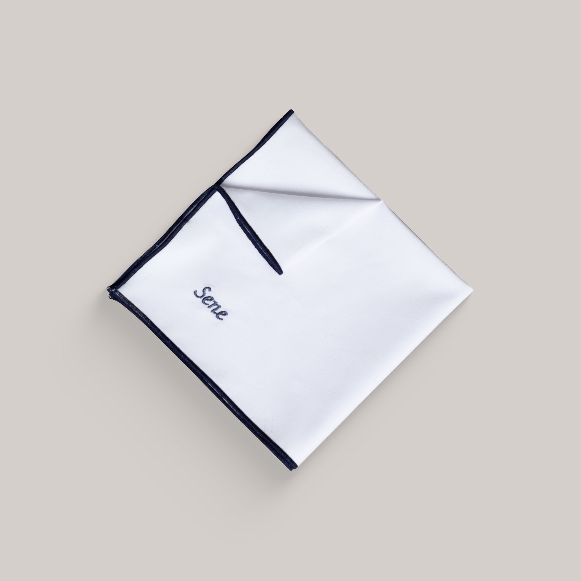 pocket square model flatlay in White