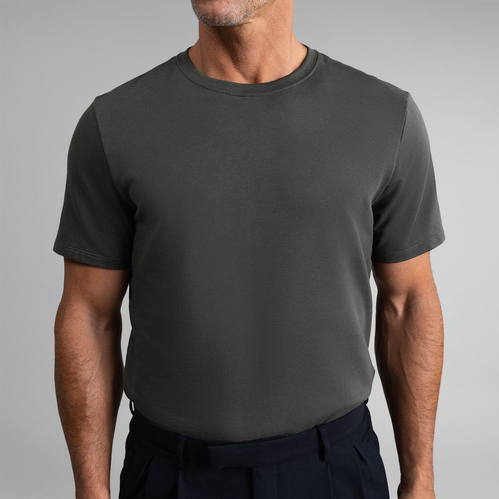 Ten t-shirts in White, Smoke, Frost Gray, Deep Sea, Black a beige background model Tyler in Best-Seller