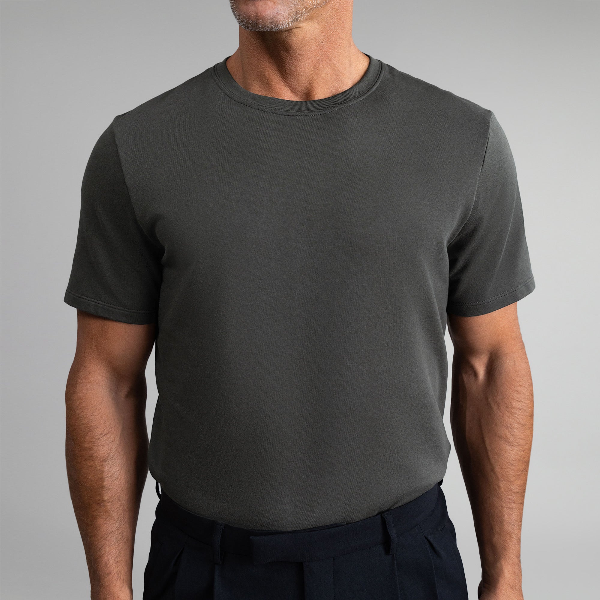 Ten t-shirts in White, Smoke, Frost Gray, Deep Sea, Black a beige background model Tyler in Best-Seller