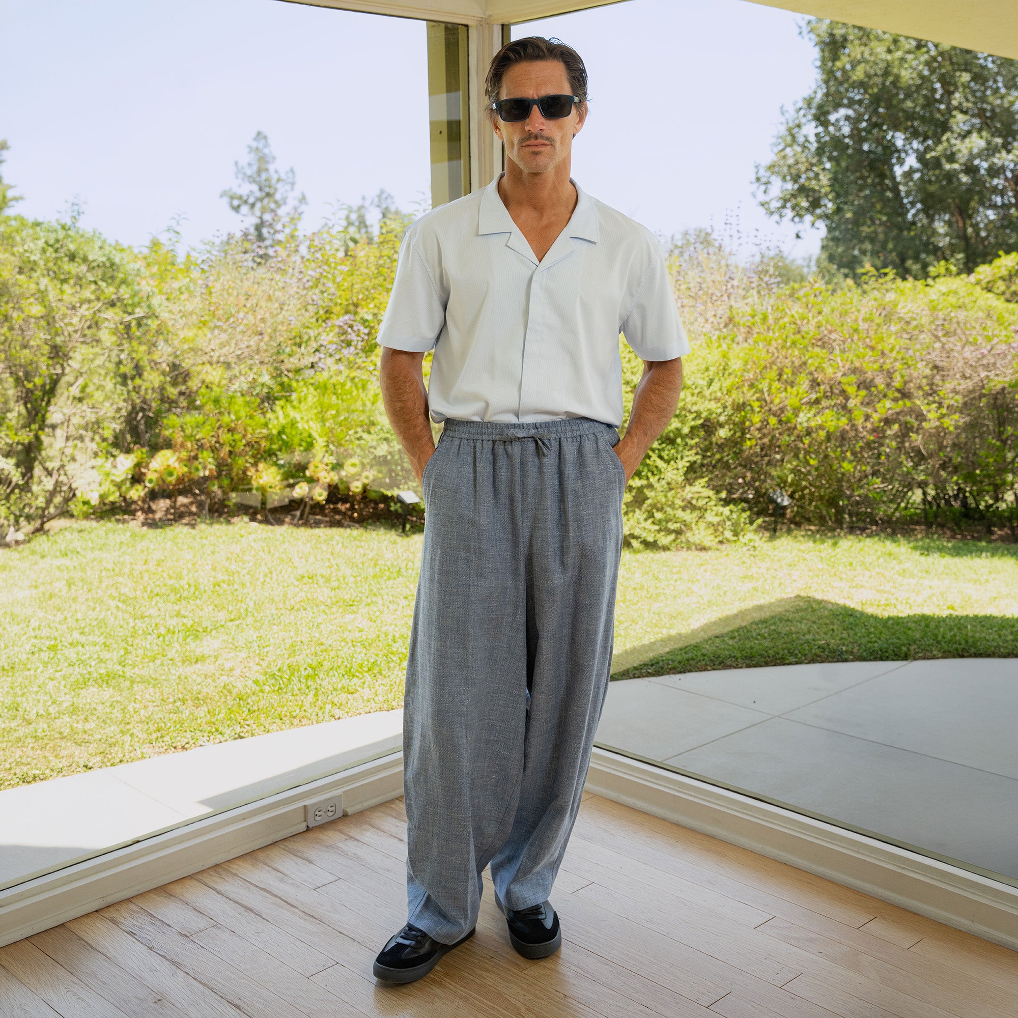 Drawstring Wide Leg Pant model tyler in Light Blue