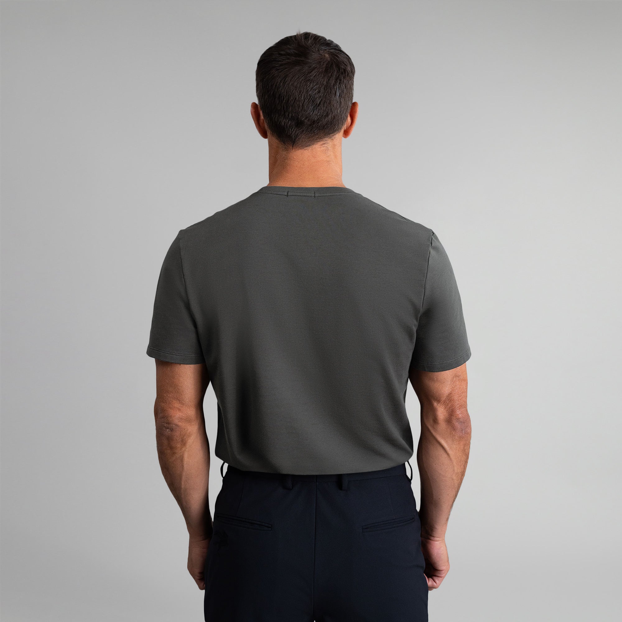 Ten t-shirts in White, Smoke, Frost Gray, Deep Sea, Black a beige background model Tyler in Best-Seller