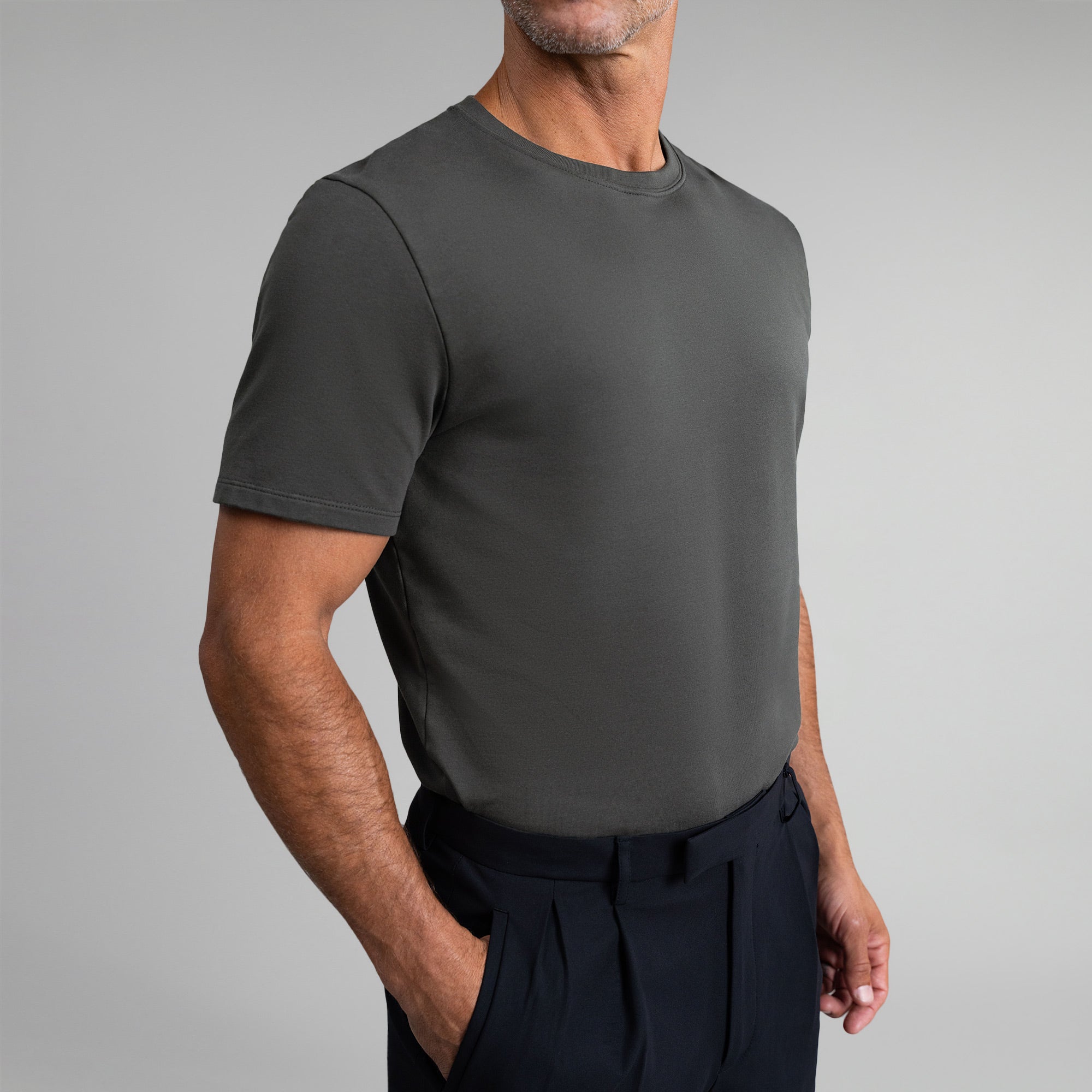 Ten t-shirts in White, Smoke, Frost Gray, Deep Sea, Black a beige background model Tyler in Best-Seller