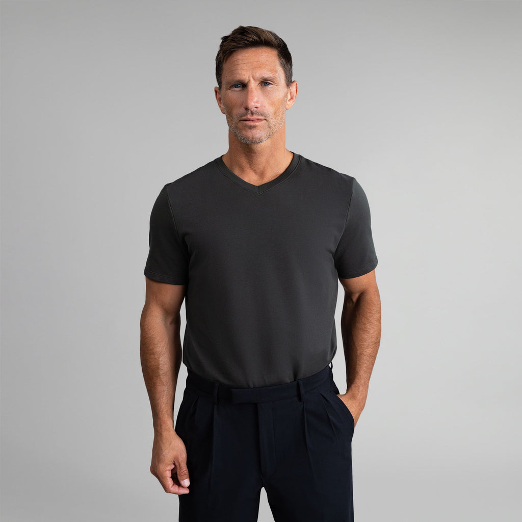 Cumulus v-neck t-shirt on a beige background model Tyler in Best-Seller