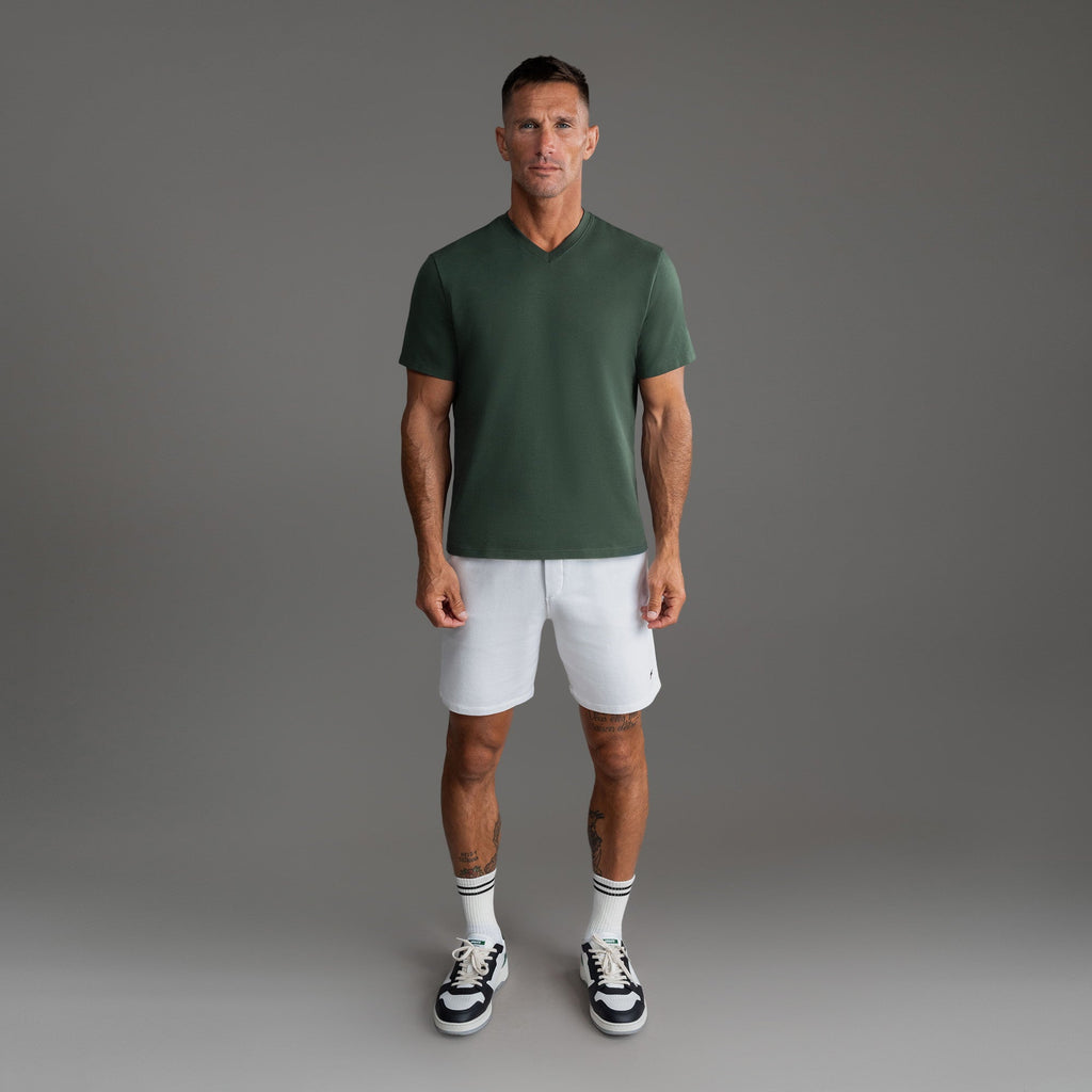 Cumulus v-neck t-shirt on a beige background model Tyler in Best-Seller