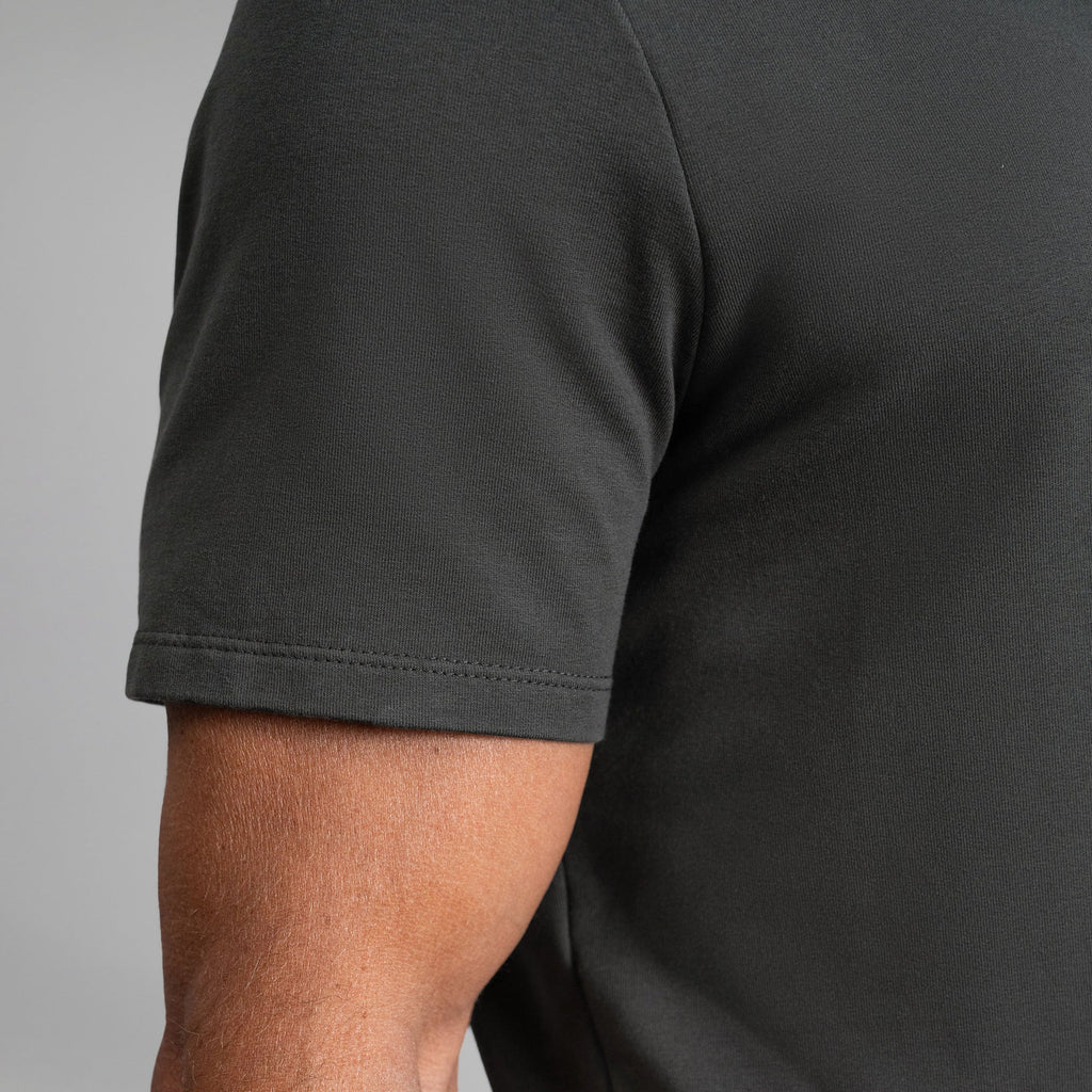 Cumulus v-neck t-shirt on a beige background model Tyler in Best-Seller