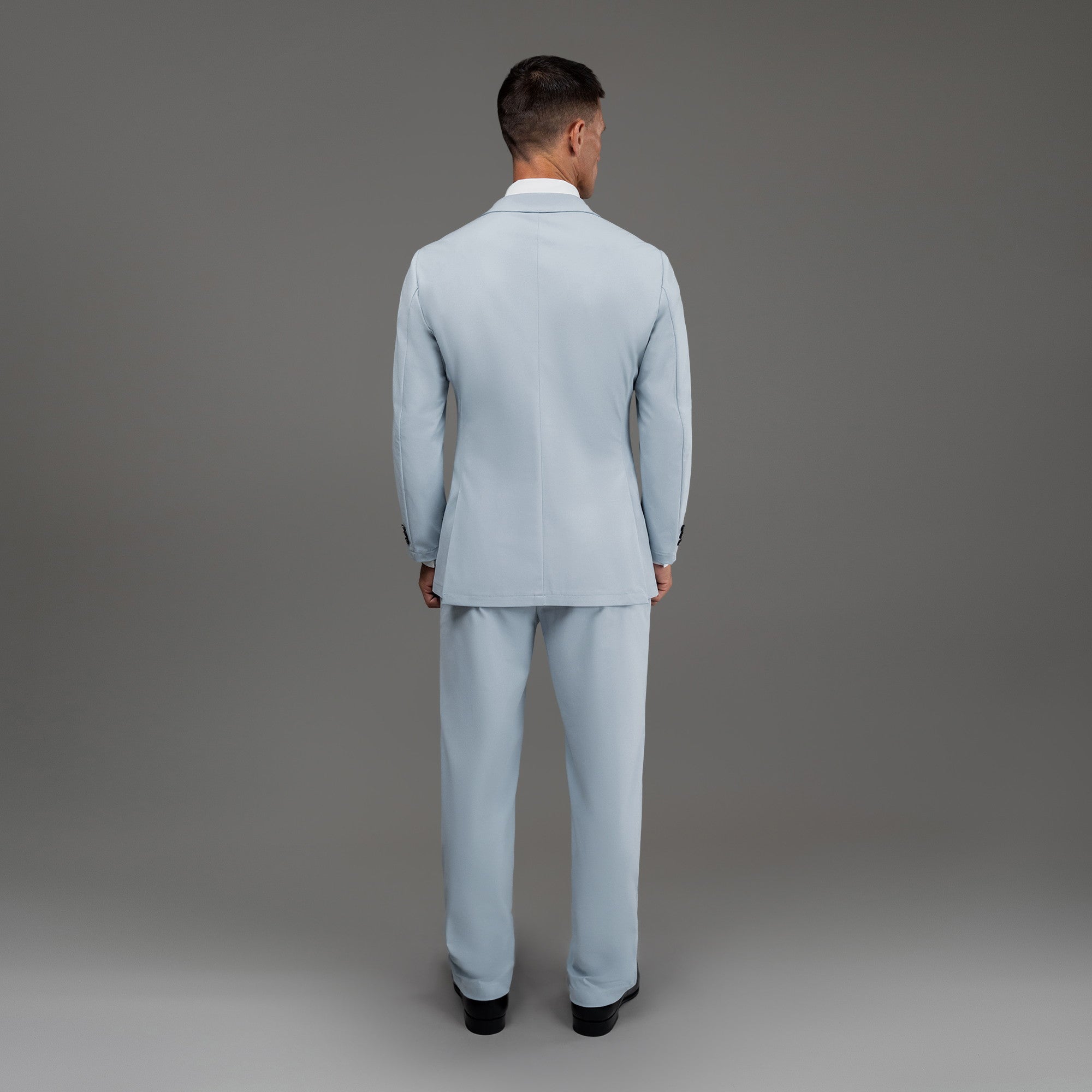 Bespoke custom athleisure technical men's suit los angeles model Tyler in Sky