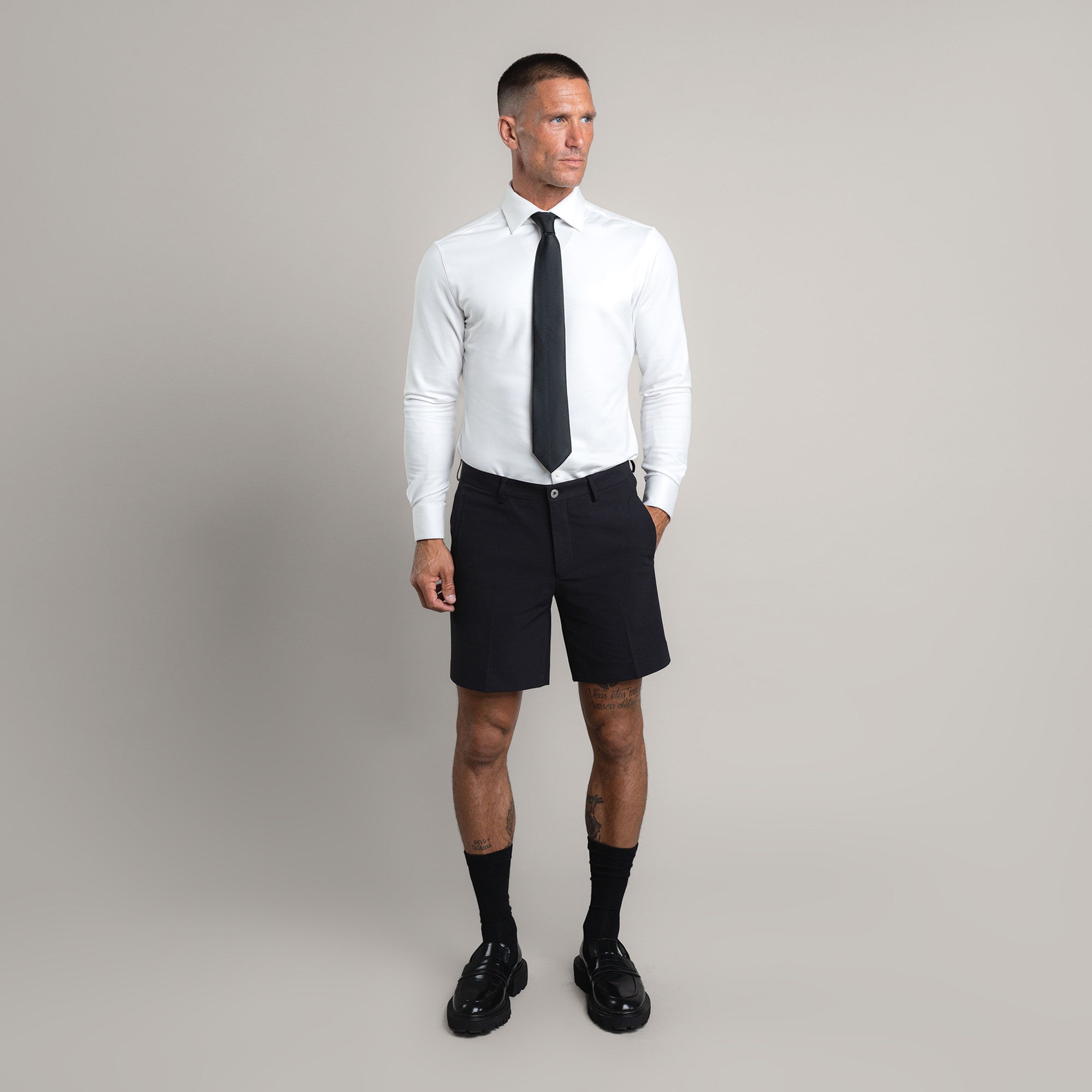 athletic bodybuilder bespoke shorts athletic build model Tyler in Black