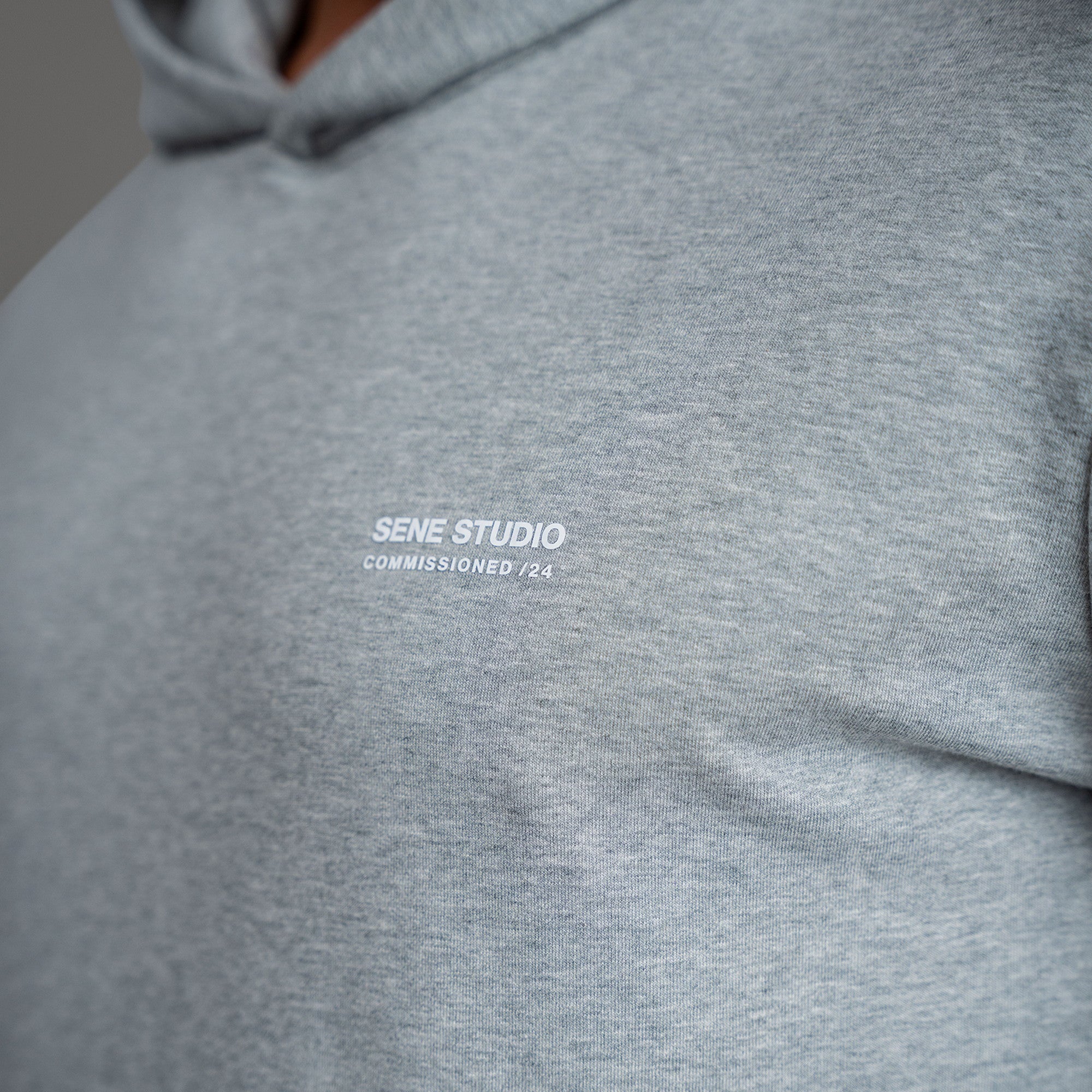 men's custom hoodie model Tyler in Heather Gray