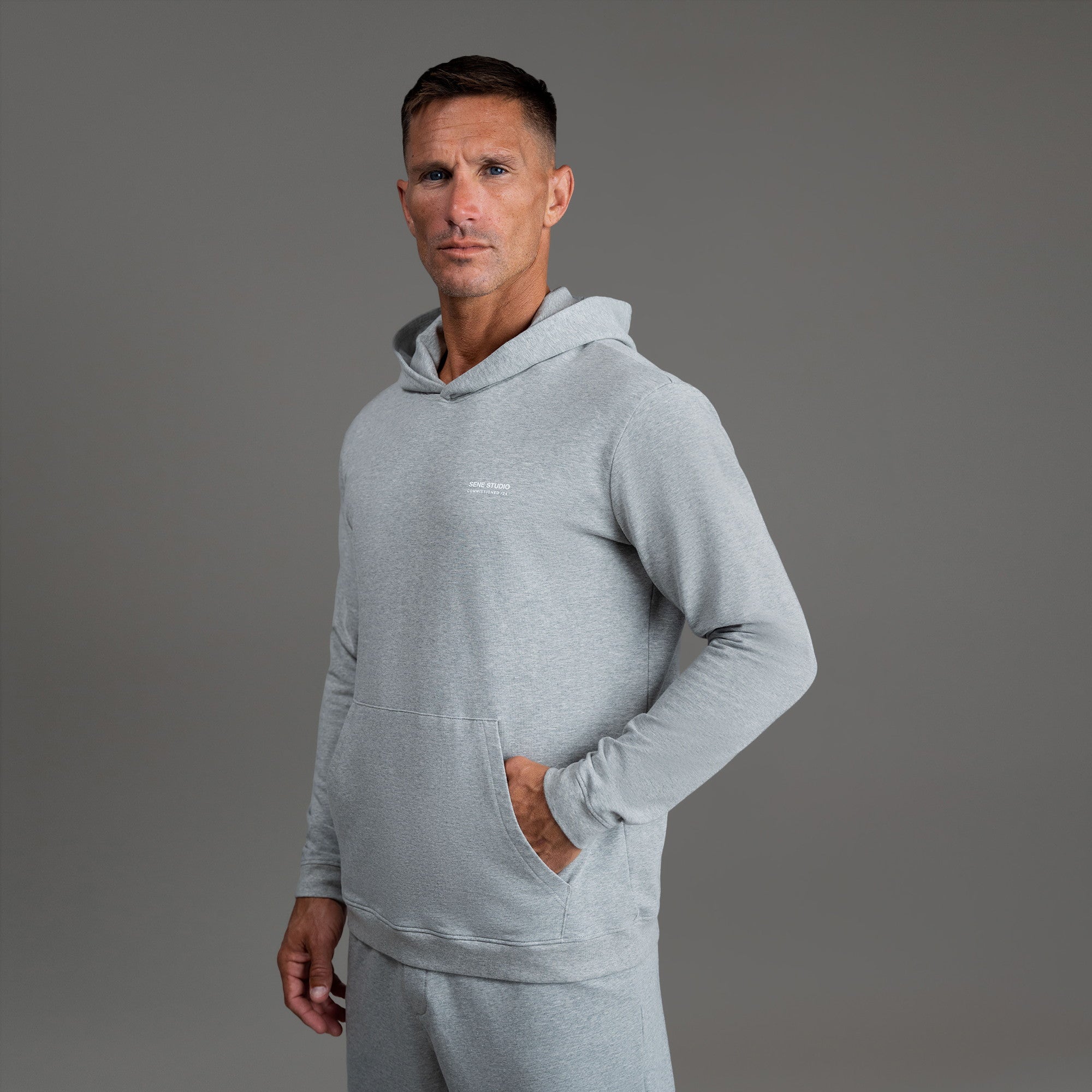 men's custom hoodie model Tyler in Heather Gray