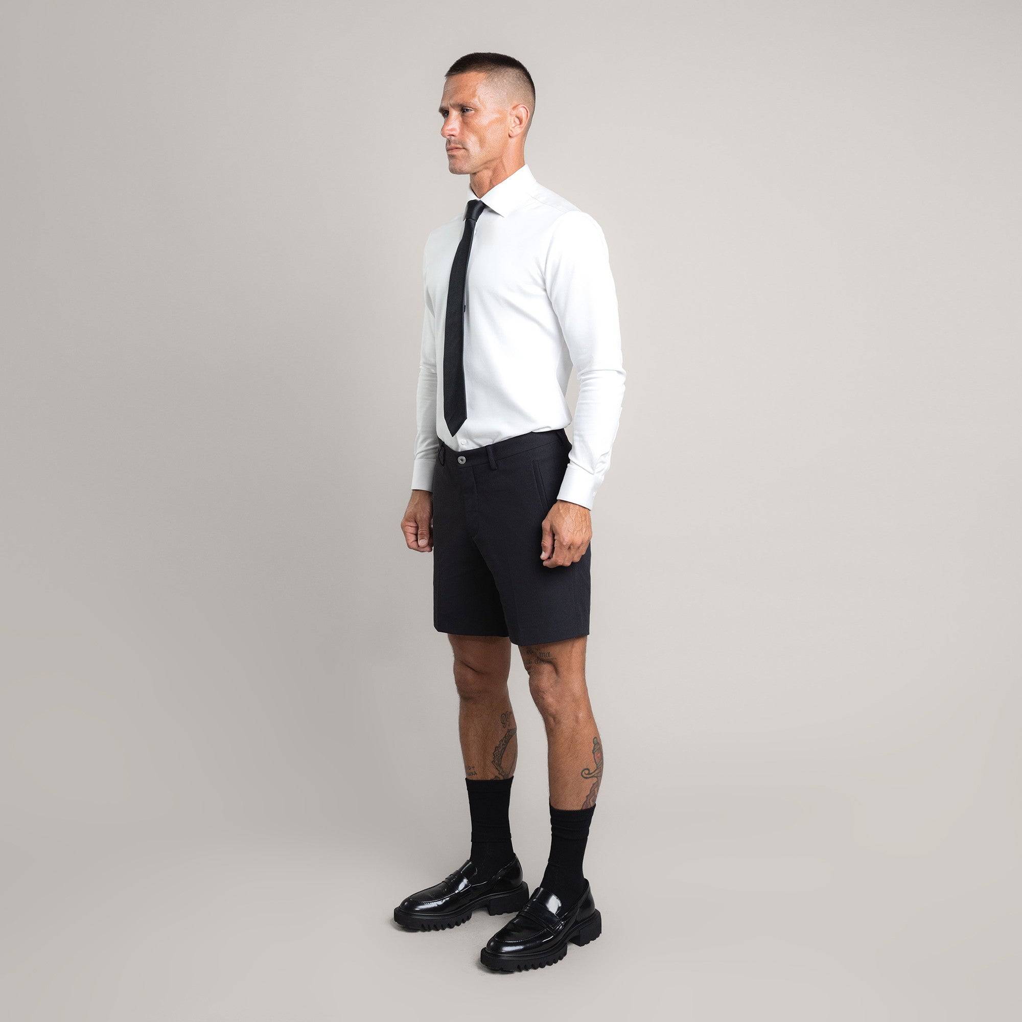 athletic bodybuilder bespoke shorts athletic build model Tyler in Black