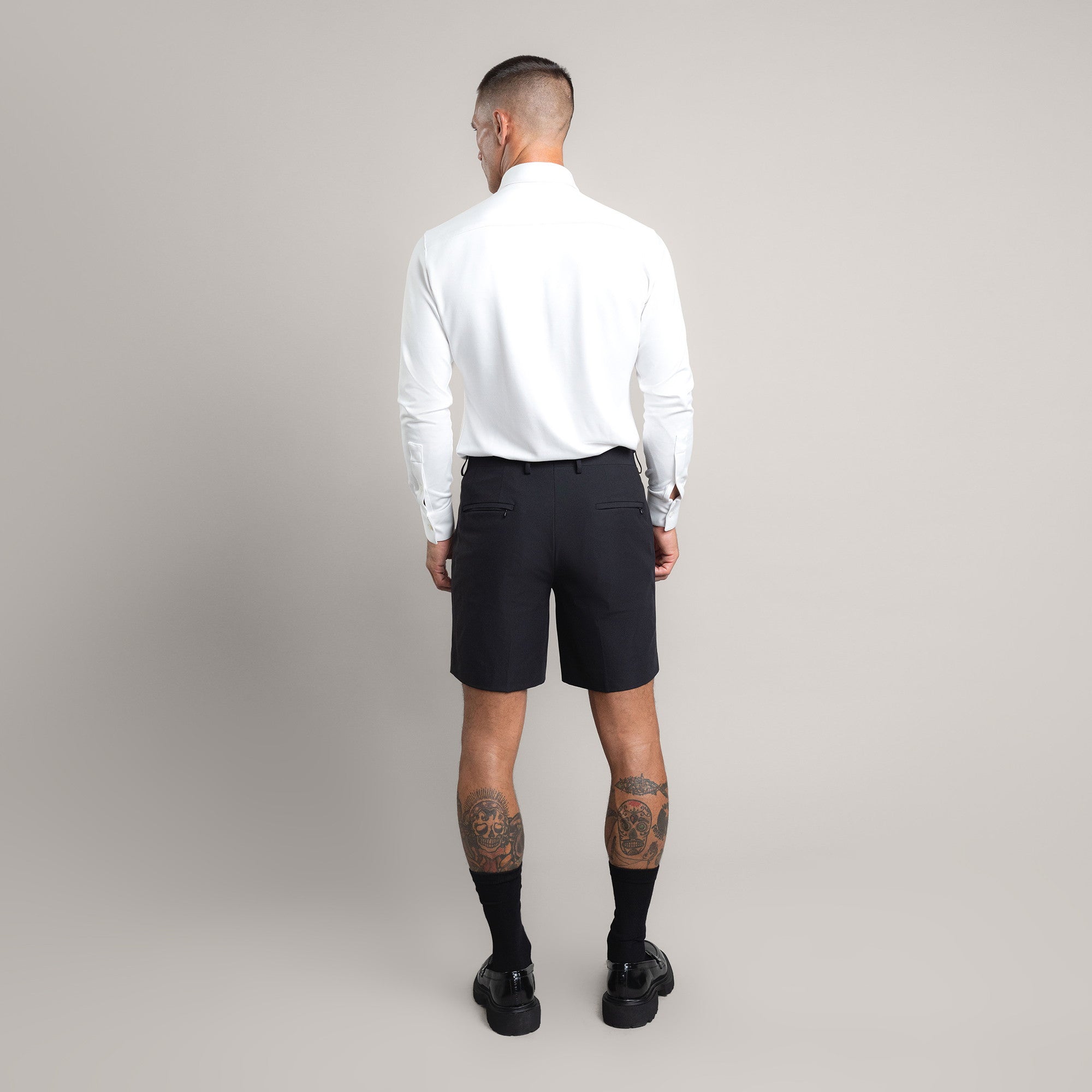 athletic bodybuilder bespoke shorts athletic build model Tyler in Black