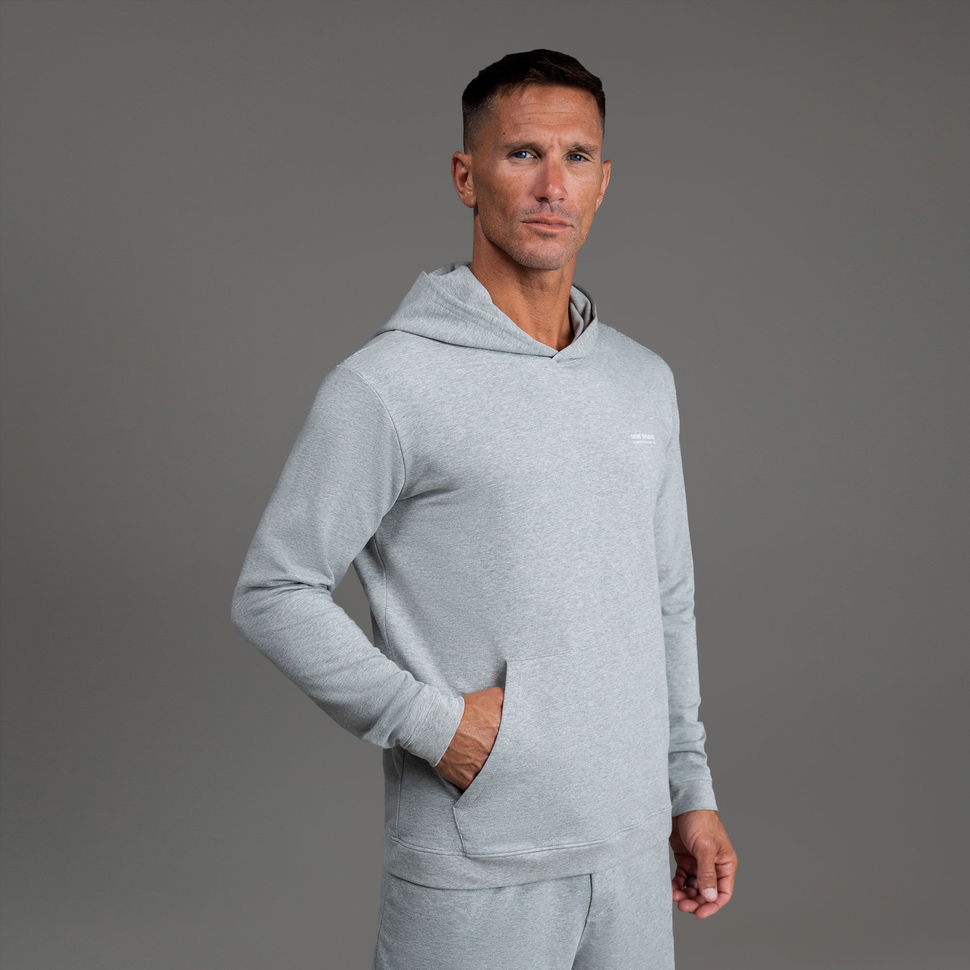 men's custom hoodie model Tyler in Heather Gray