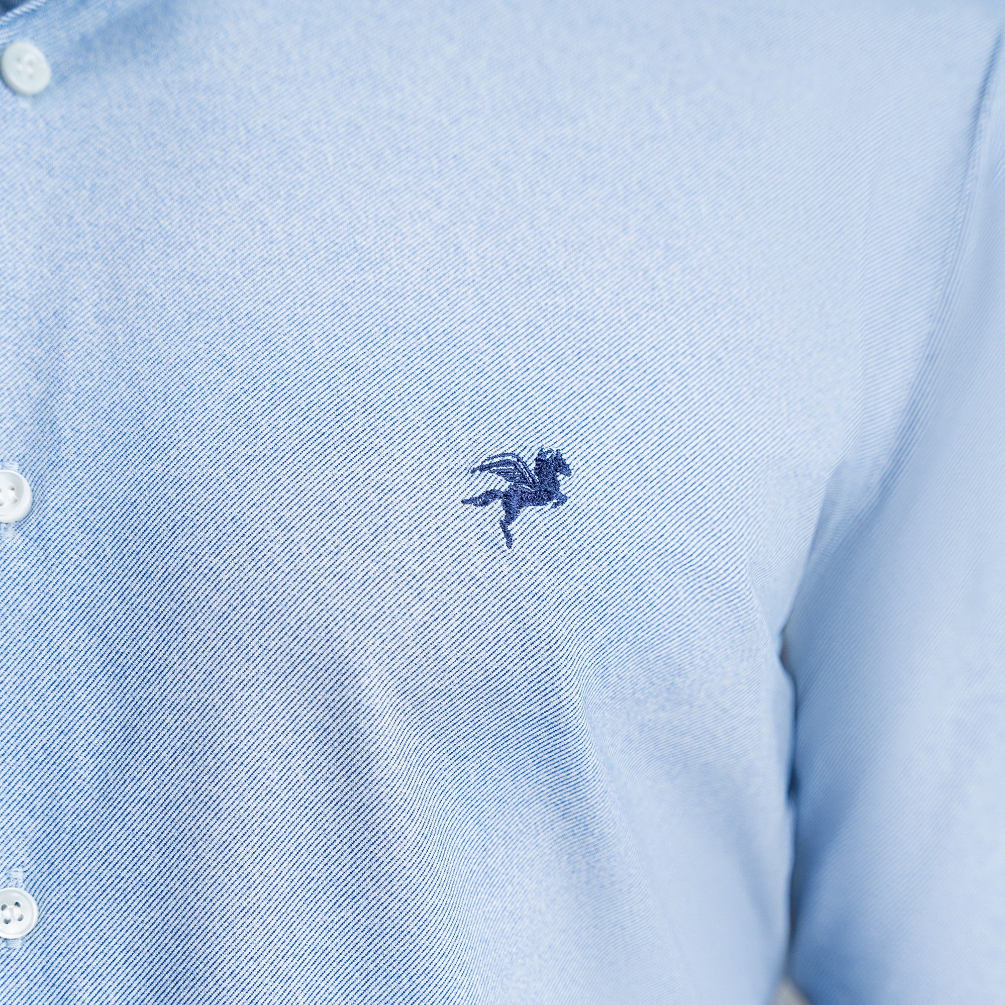 Custom Bespoke Tailored Mercer Shirt model Tyler in Light Blue Emblem