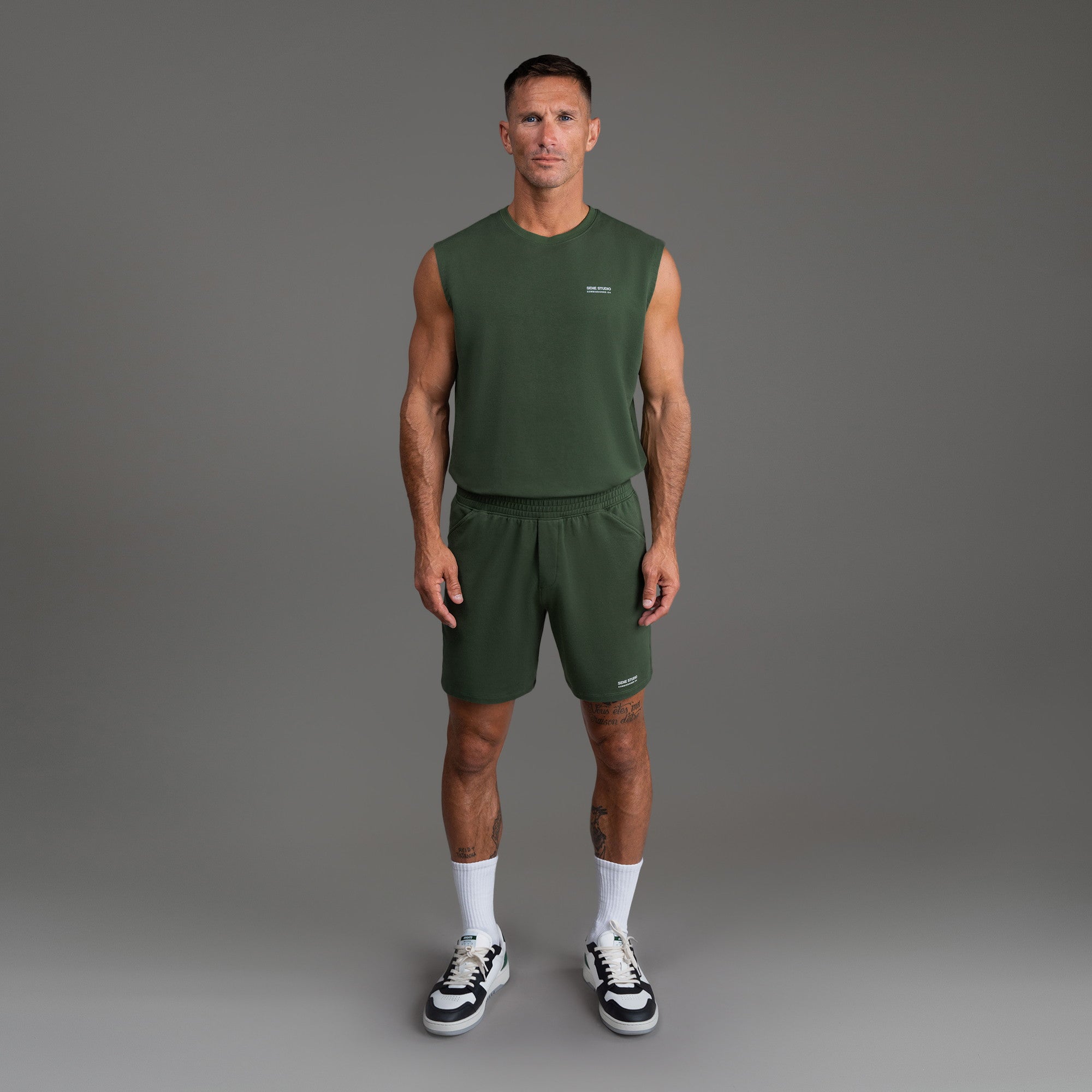 Custom bespoke shorts athleisure athletic build model Tyler in Moss