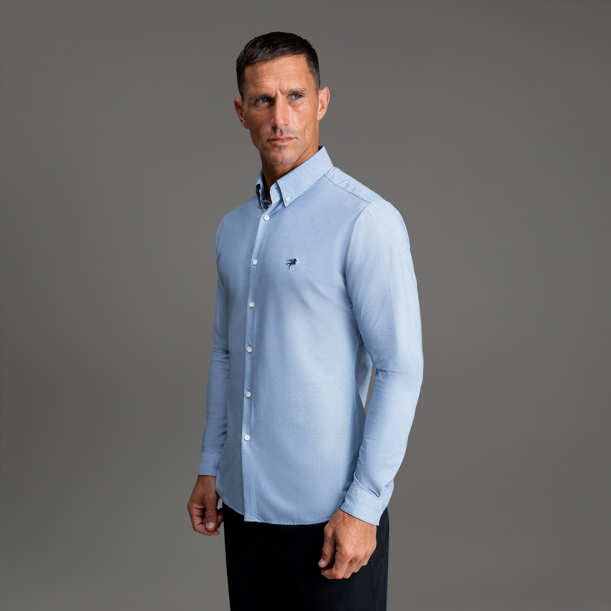Custom Bespoke Tailored Mercer Shirt model Tyler in Light Blue Emblem