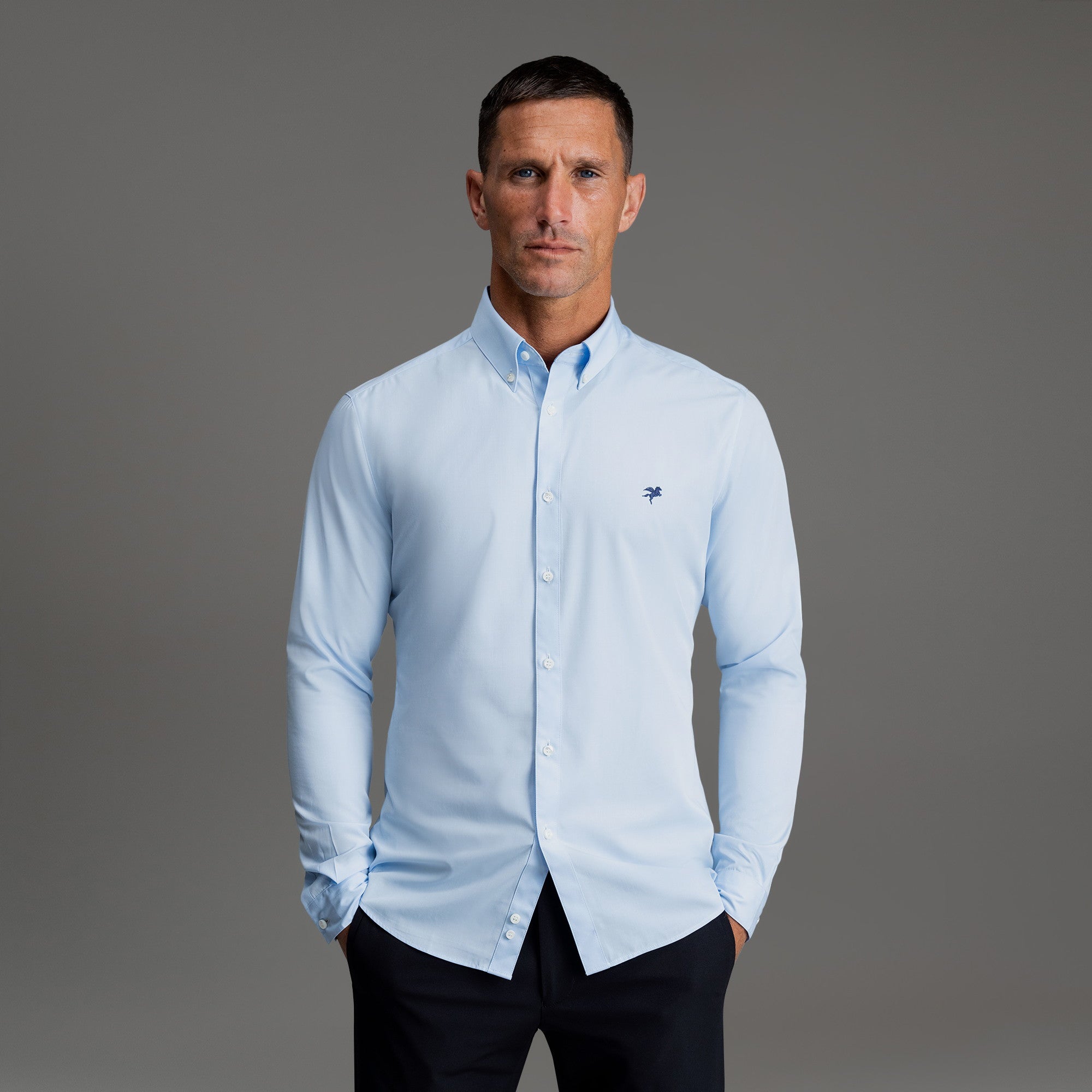 Custom Bespoke Tailored Mercer Shirt model Tyler in Light Blue Emblem