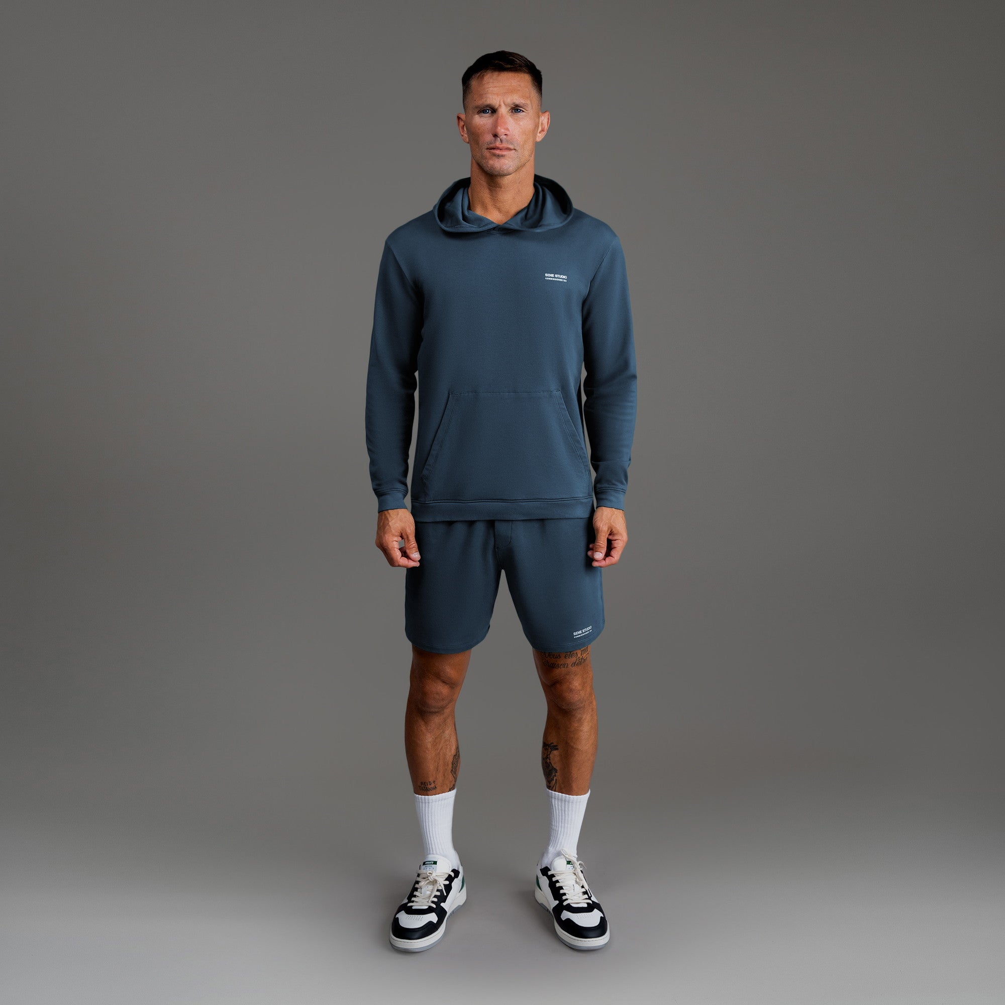 men's custom hoodie model Tyler in Deep Sea