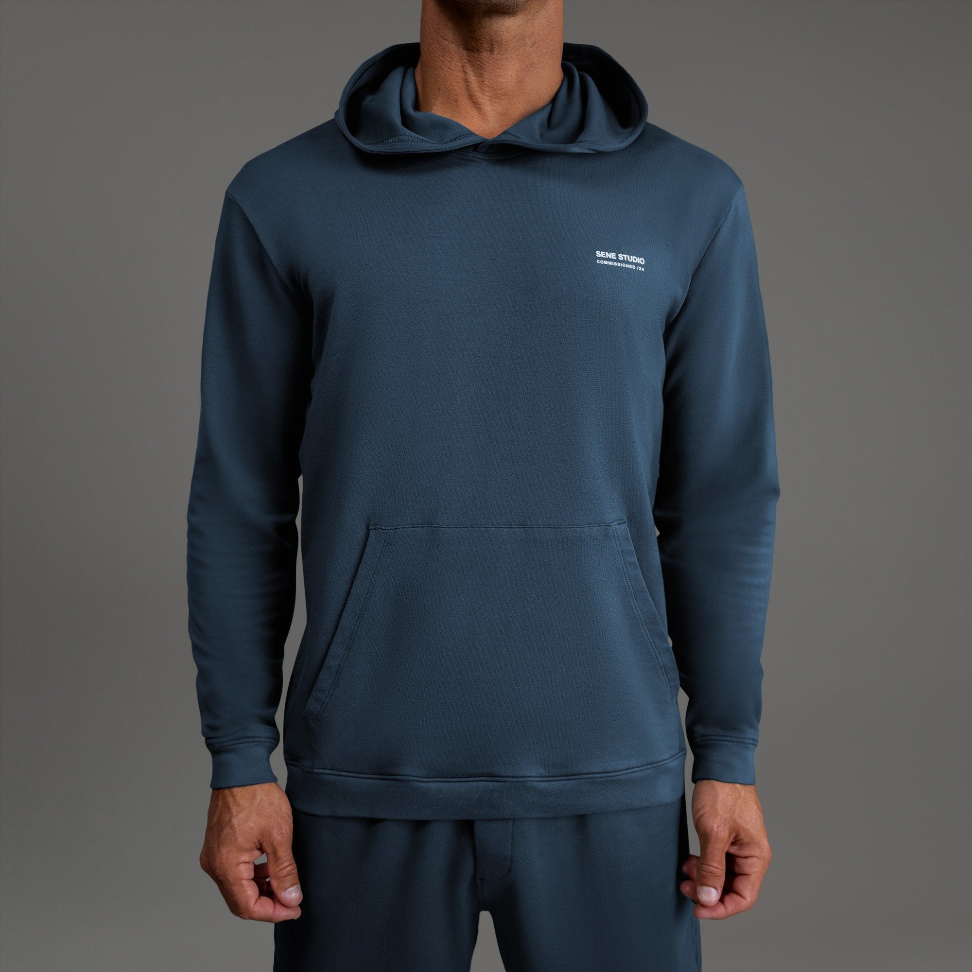 men's custom hoodie model Tyler in Deep Sea