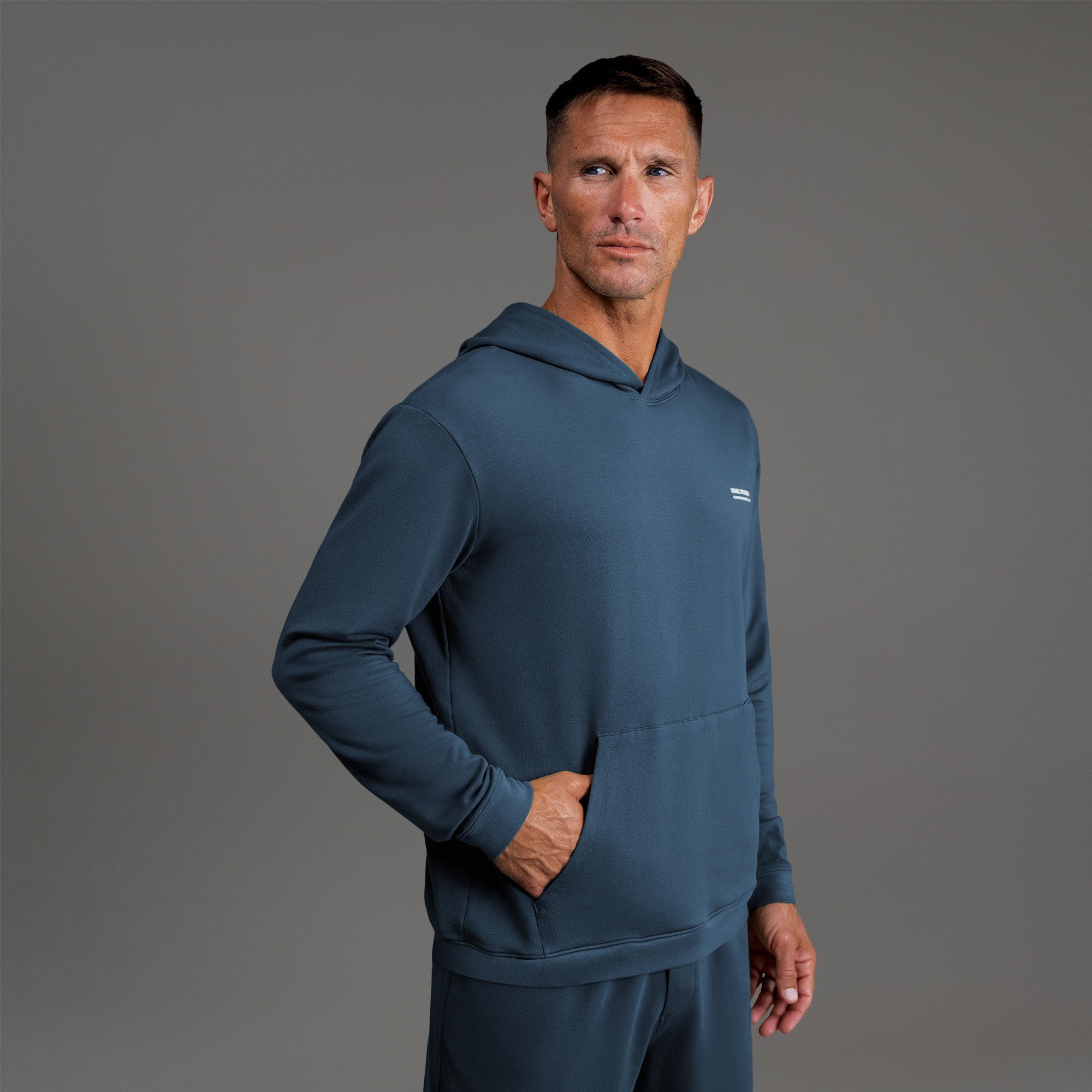 men's custom hoodie model Tyler in Deep Sea