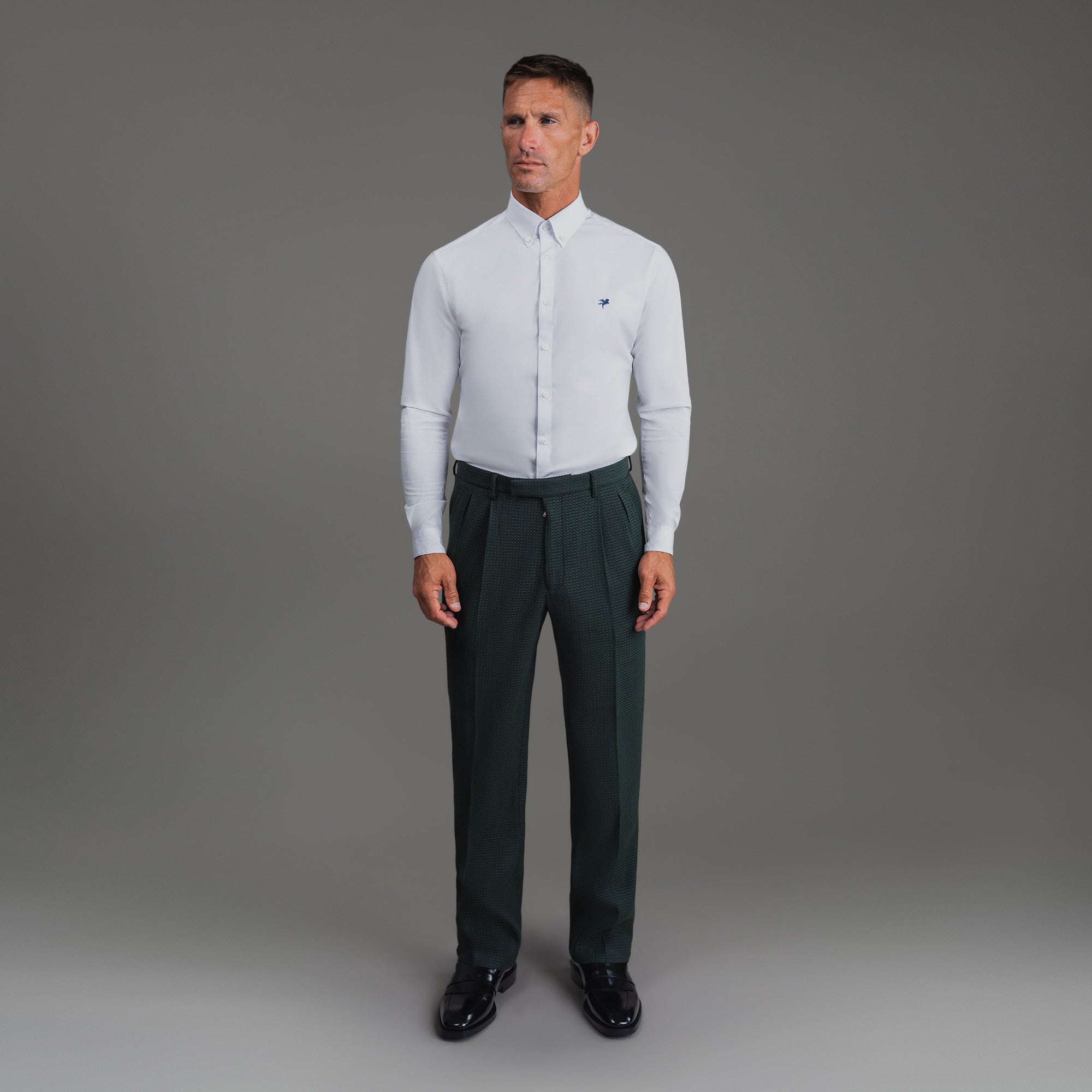 Bespoke custom athleisure technical athletic stretch suit los angeles model Tyler in Moss