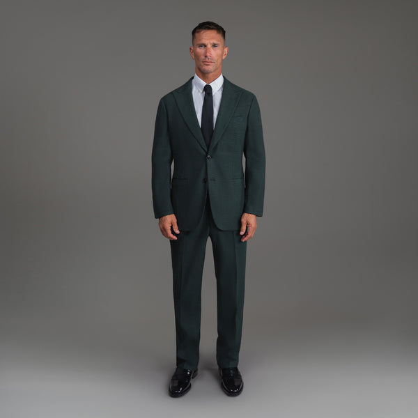 Bespoke custom athleisure technical athletic stretch suit los angeles model Tyler in Moss