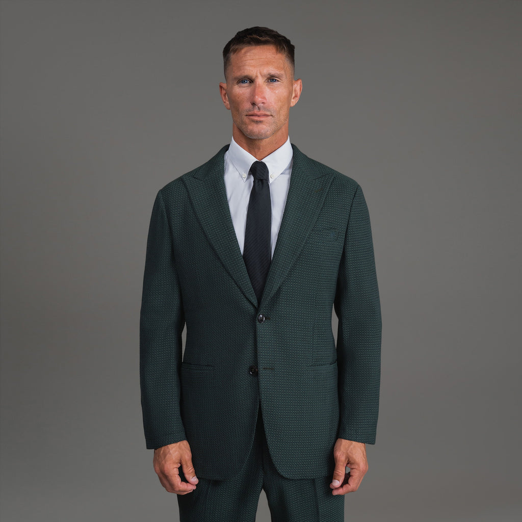 Bespoke custom athleisure technical athletic stretch suit los angeles model Tyler in Moss