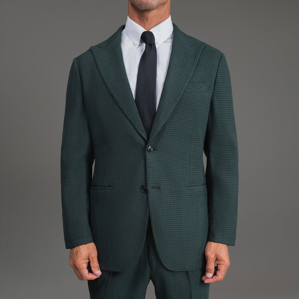 Bespoke custom athleisure technical athletic stretch suit los angeles model Tyler in Moss