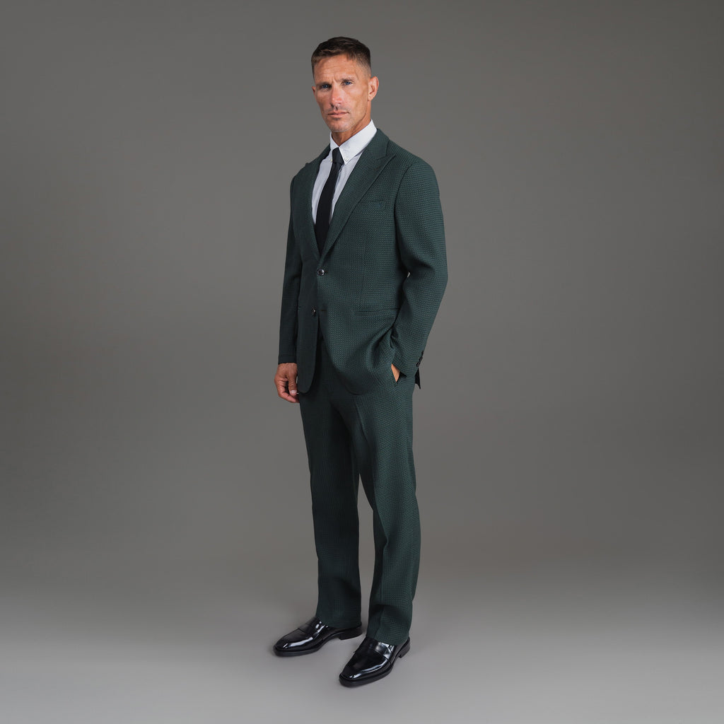 Bespoke custom athleisure technical athletic stretch suit los angeles model Tyler in Moss
