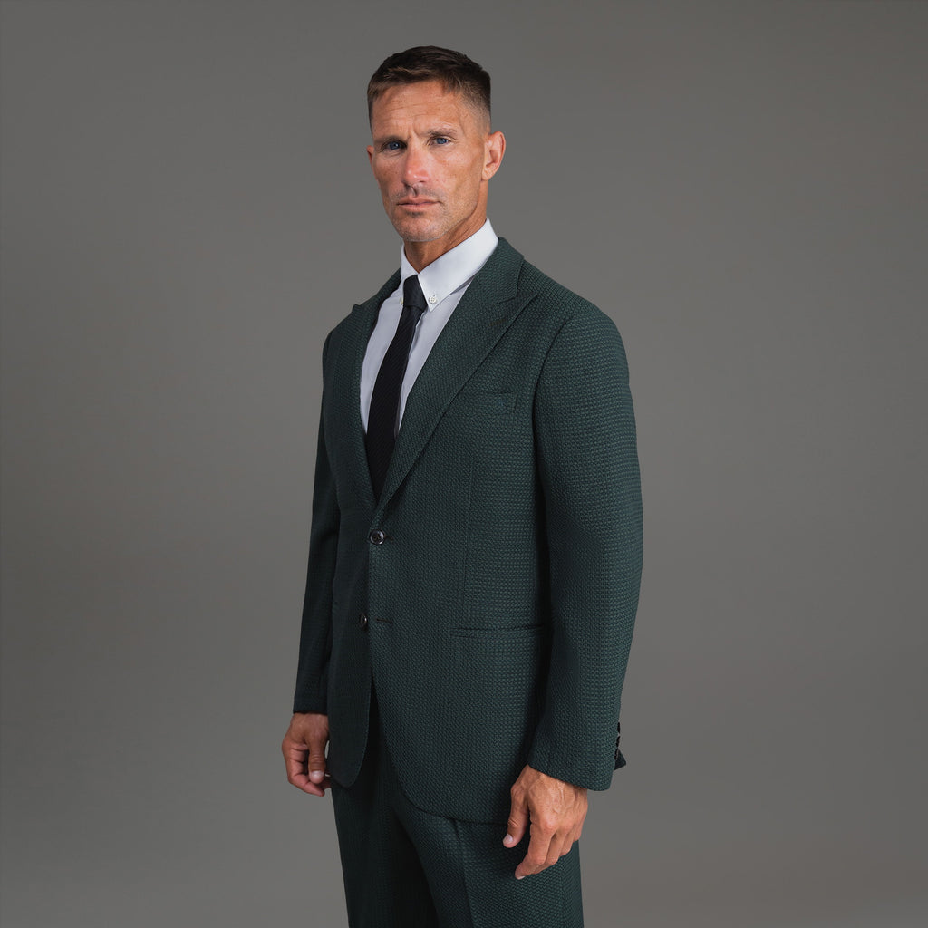 Bespoke custom athleisure technical athletic stretch suit los angeles model Tyler in Moss