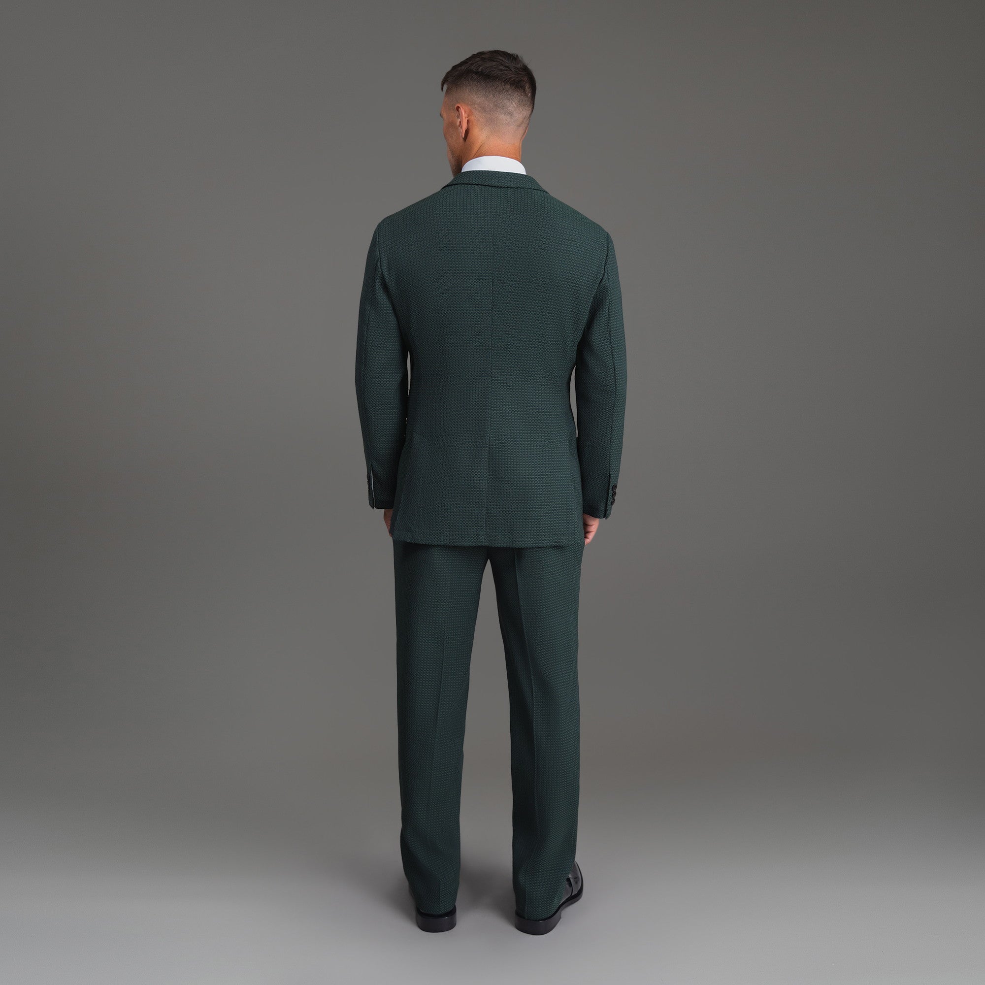 Bespoke custom athleisure technical athletic stretch suit los angeles model Tyler in Moss