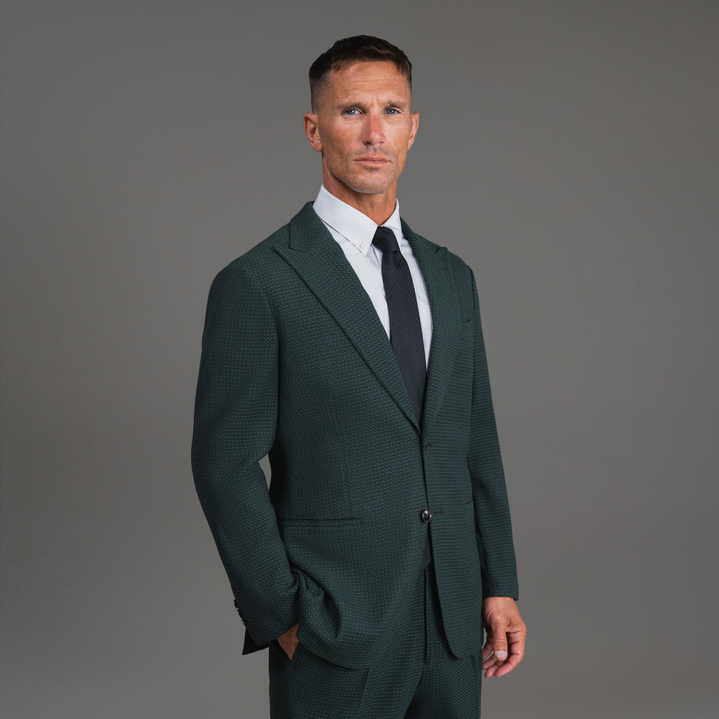 Bespoke custom athleisure technical athletic stretch suit los angeles model Tyler in Moss