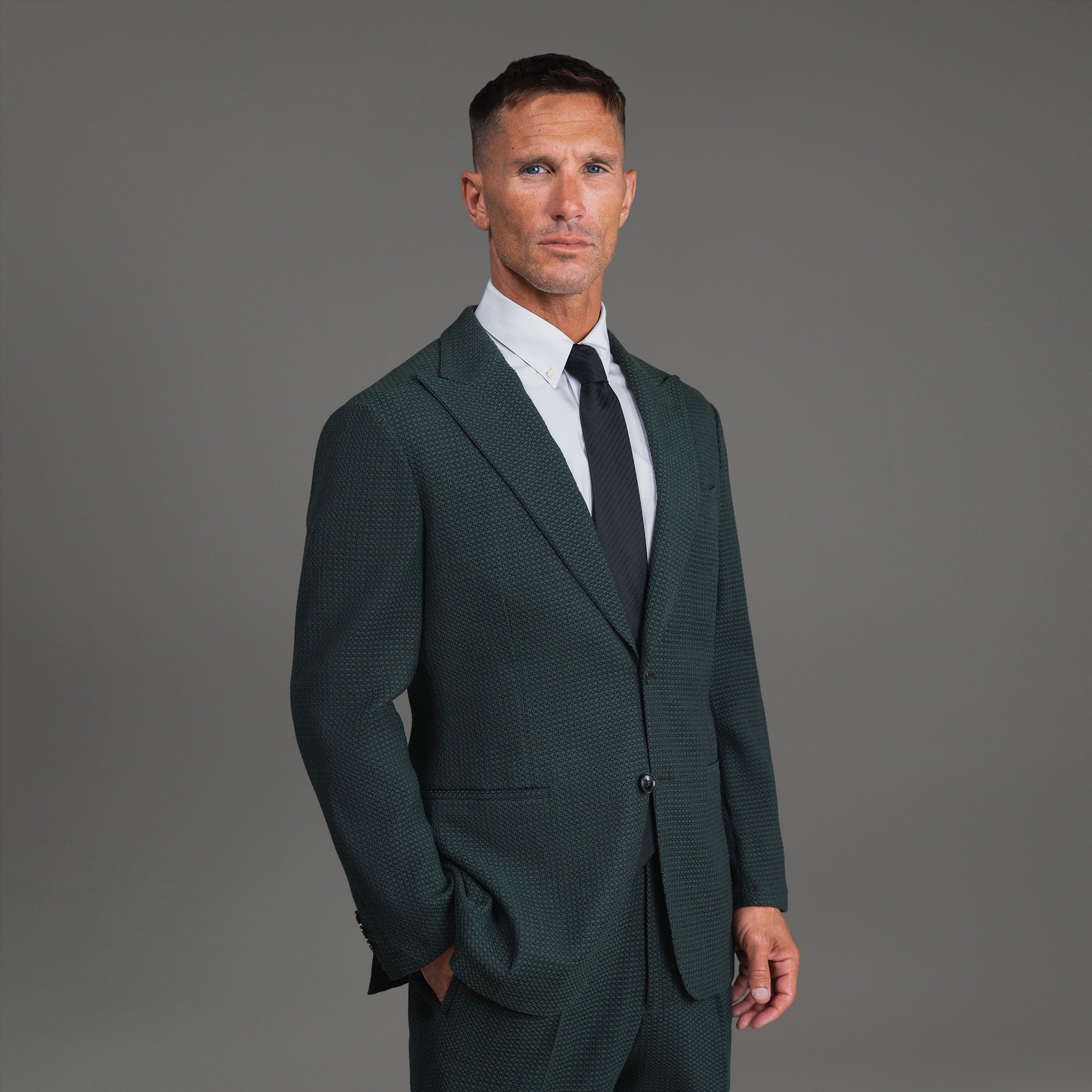 Bespoke custom athleisure technical athletic stretch suit los angeles model Tyler in Moss