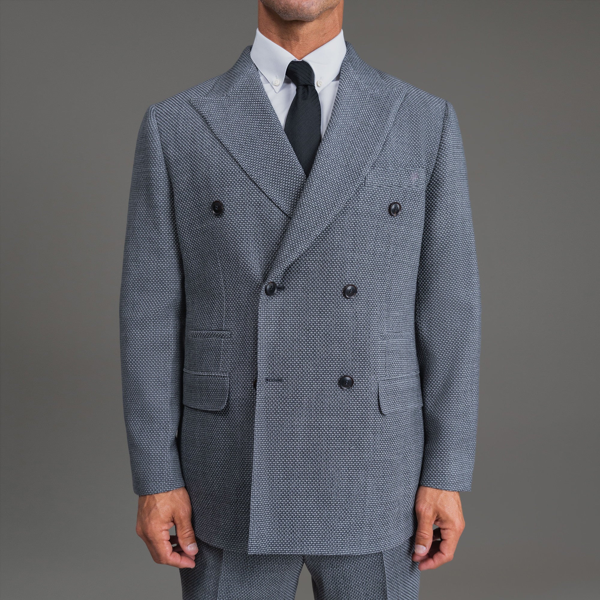 Bespoke custom athleisure technical athletic stretch suit los angeles model Tyler in Silver