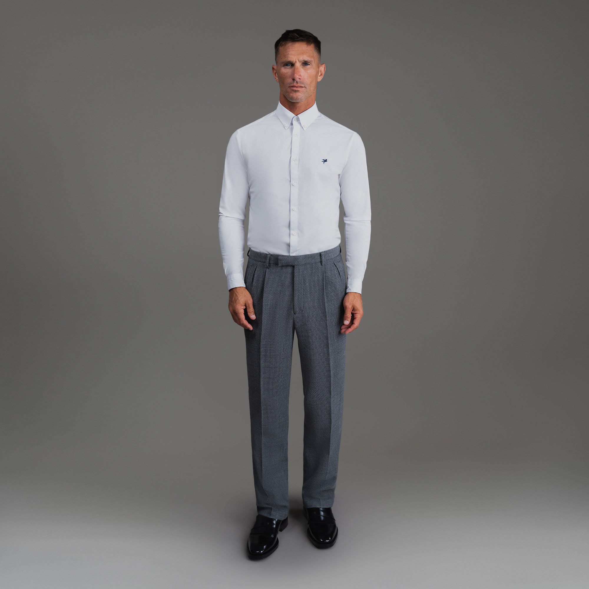 Bespoke custom athleisure technical athletic stretch suit los angeles model Tyler in Silver