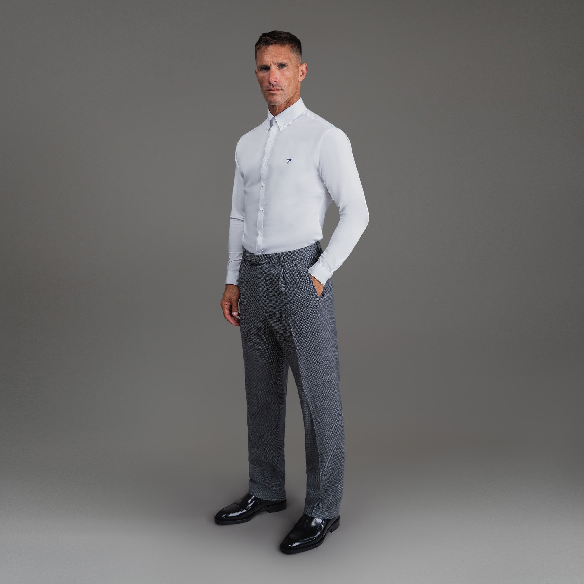 Bespoke custom athleisure technical athletic stretch suit los angeles model Tyler in Silver